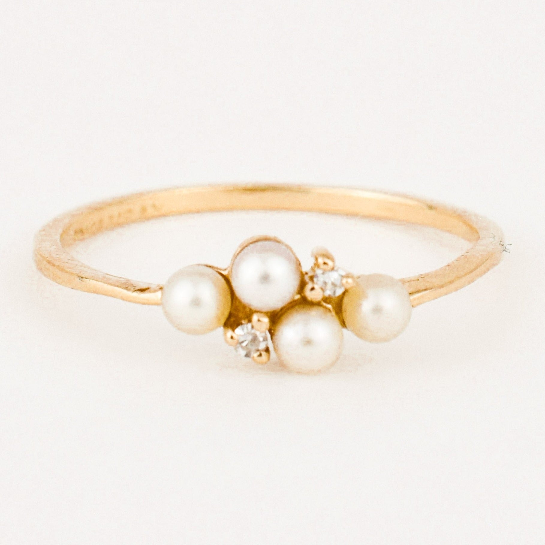 dainty vintage pearl and diamond ring