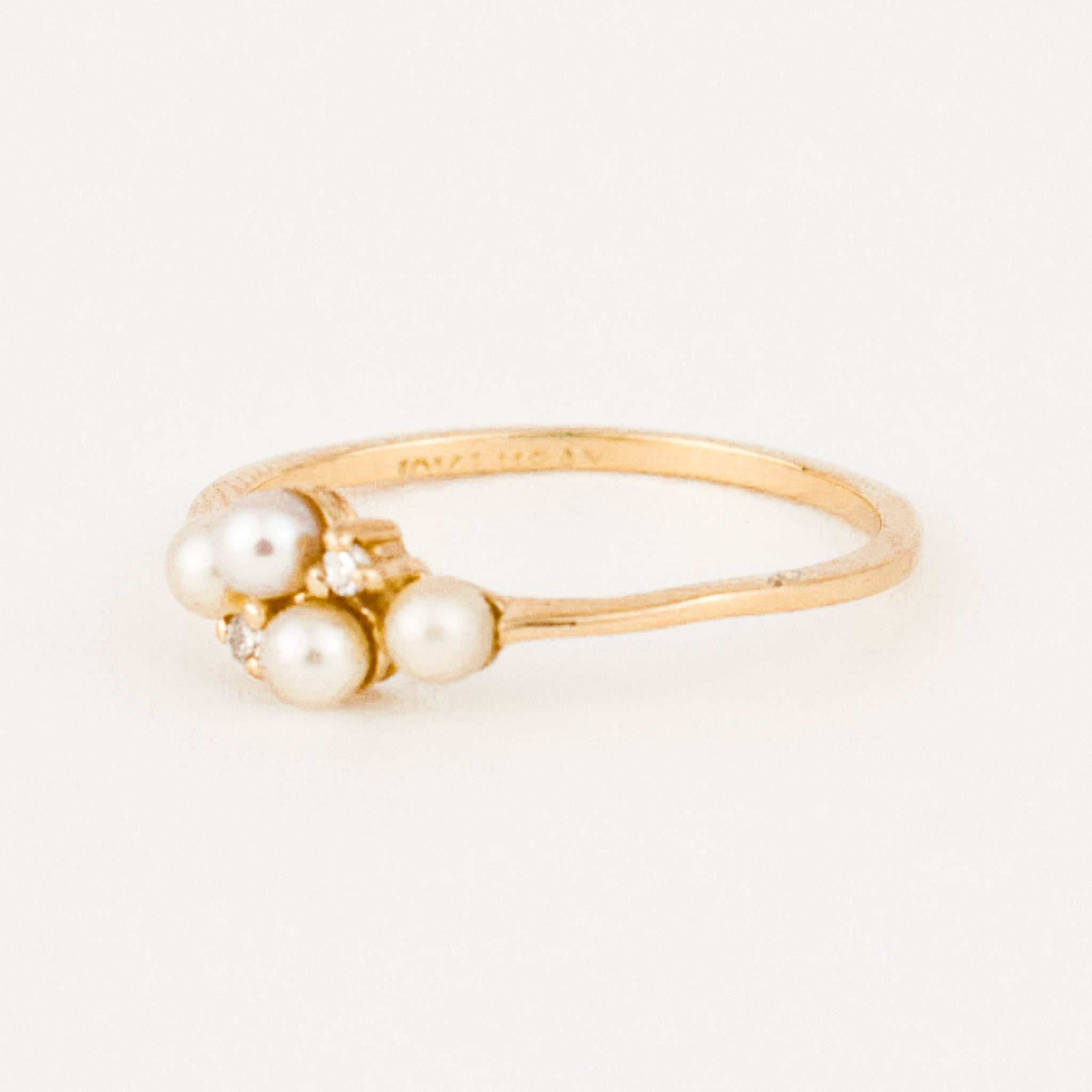 dainty vintage pearl and diamond ring