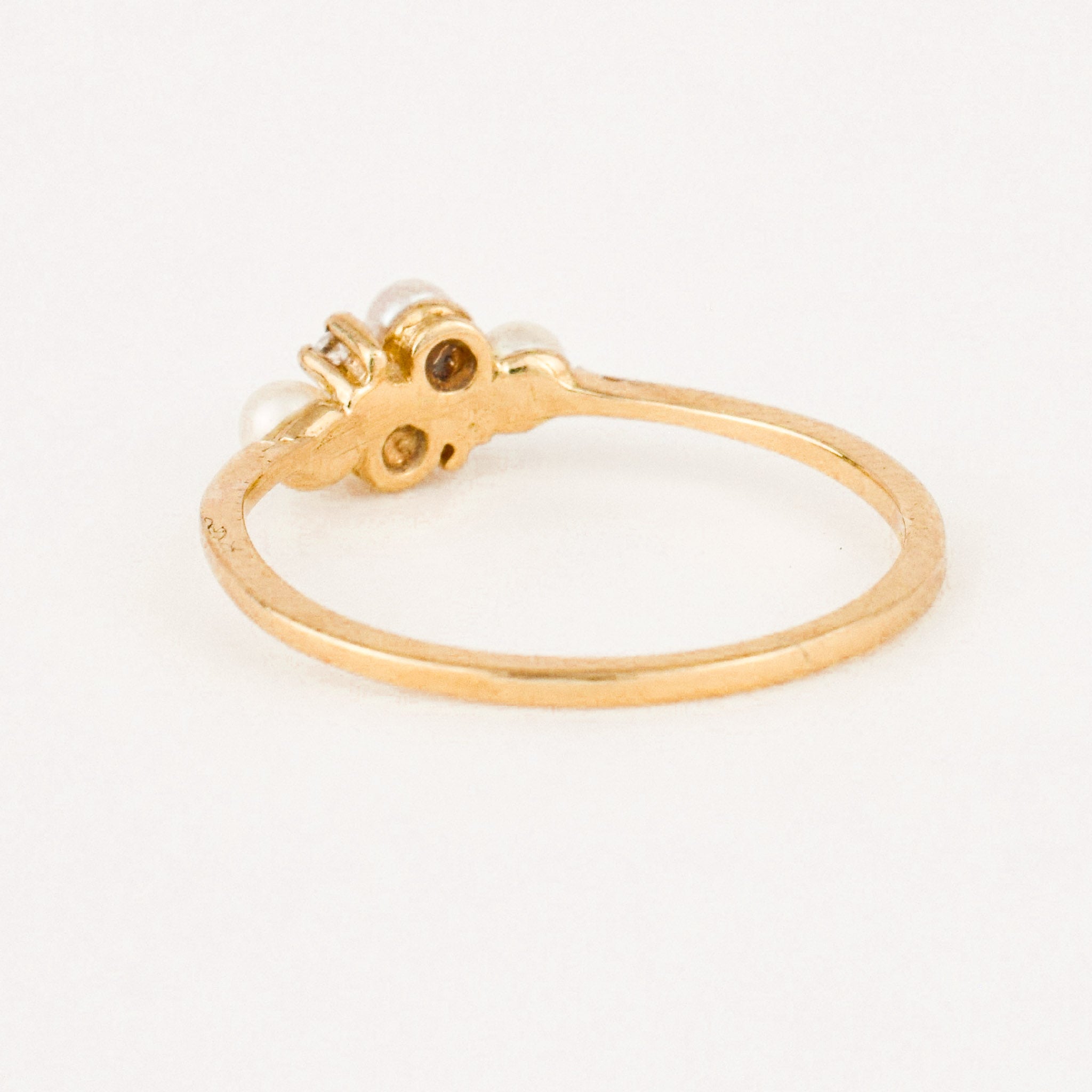 dainty vintage pearl and diamond ring