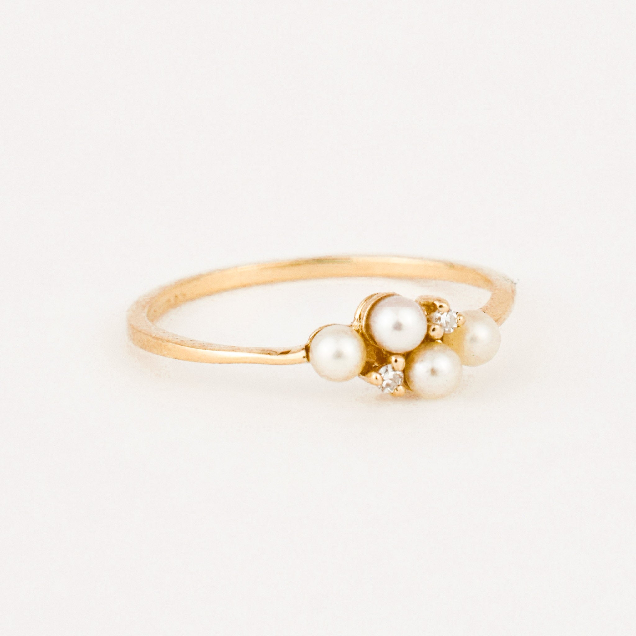 dainty vintage pearl and diamond ring