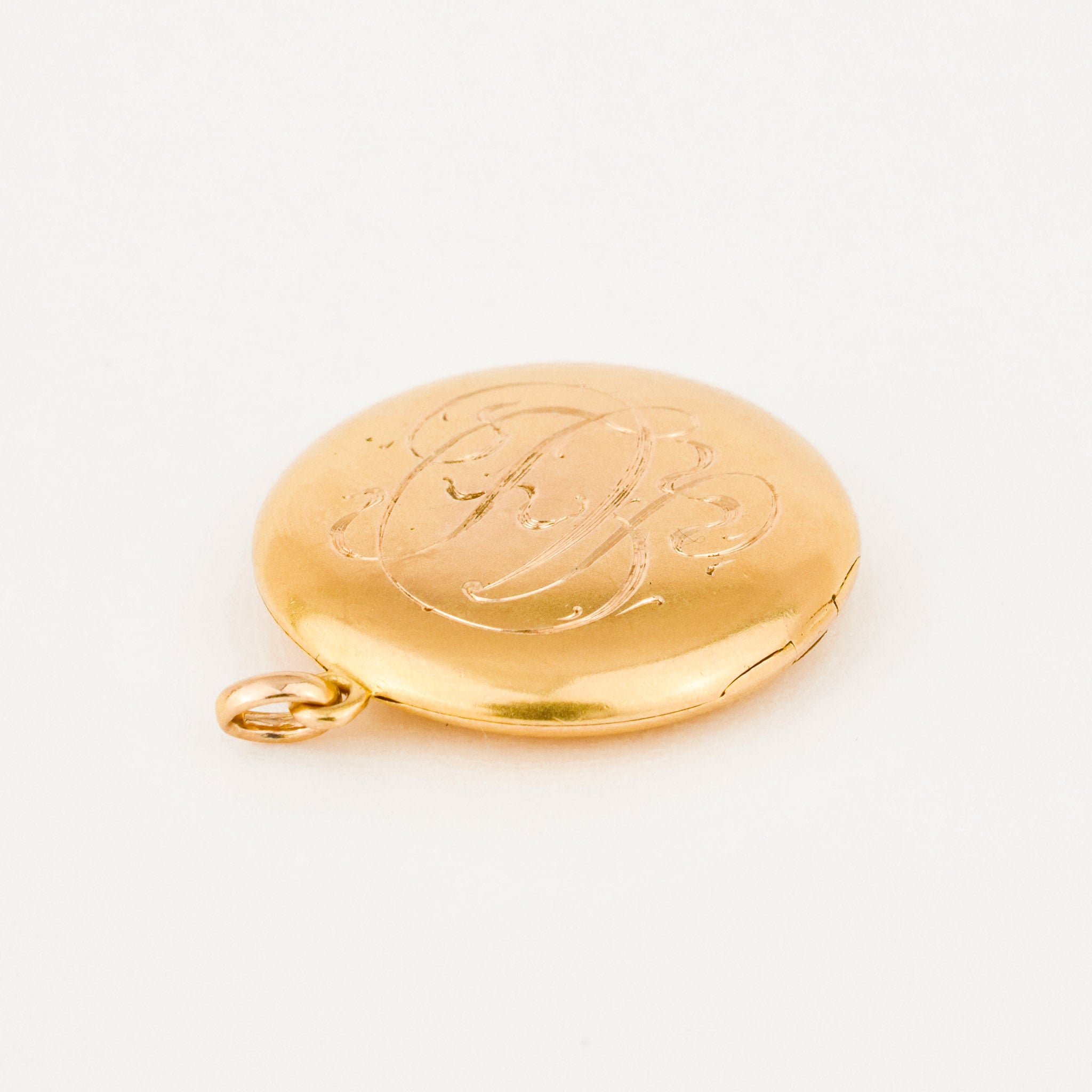 antique 'AD' gold locket