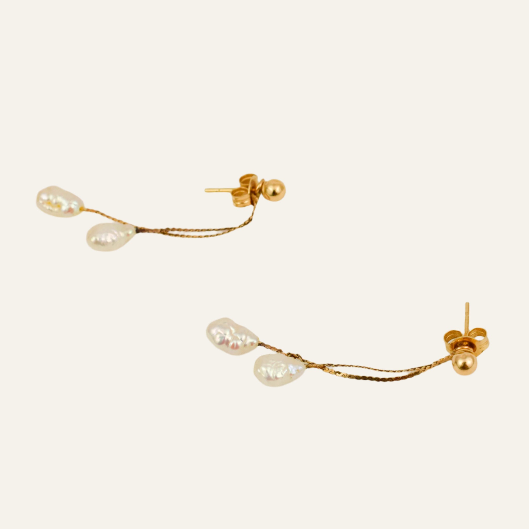 Dangling Seed Pearl Studs