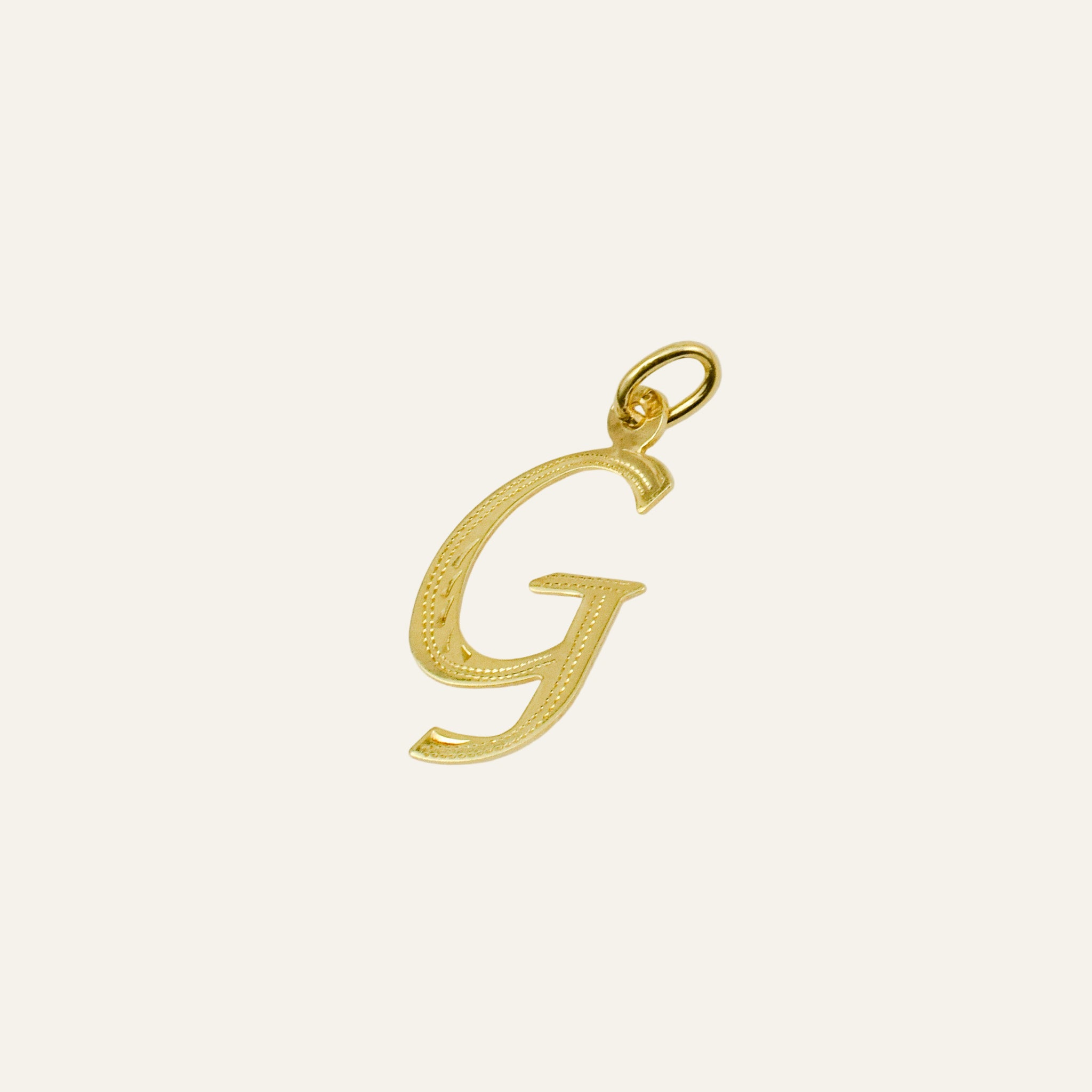 'G' Charm