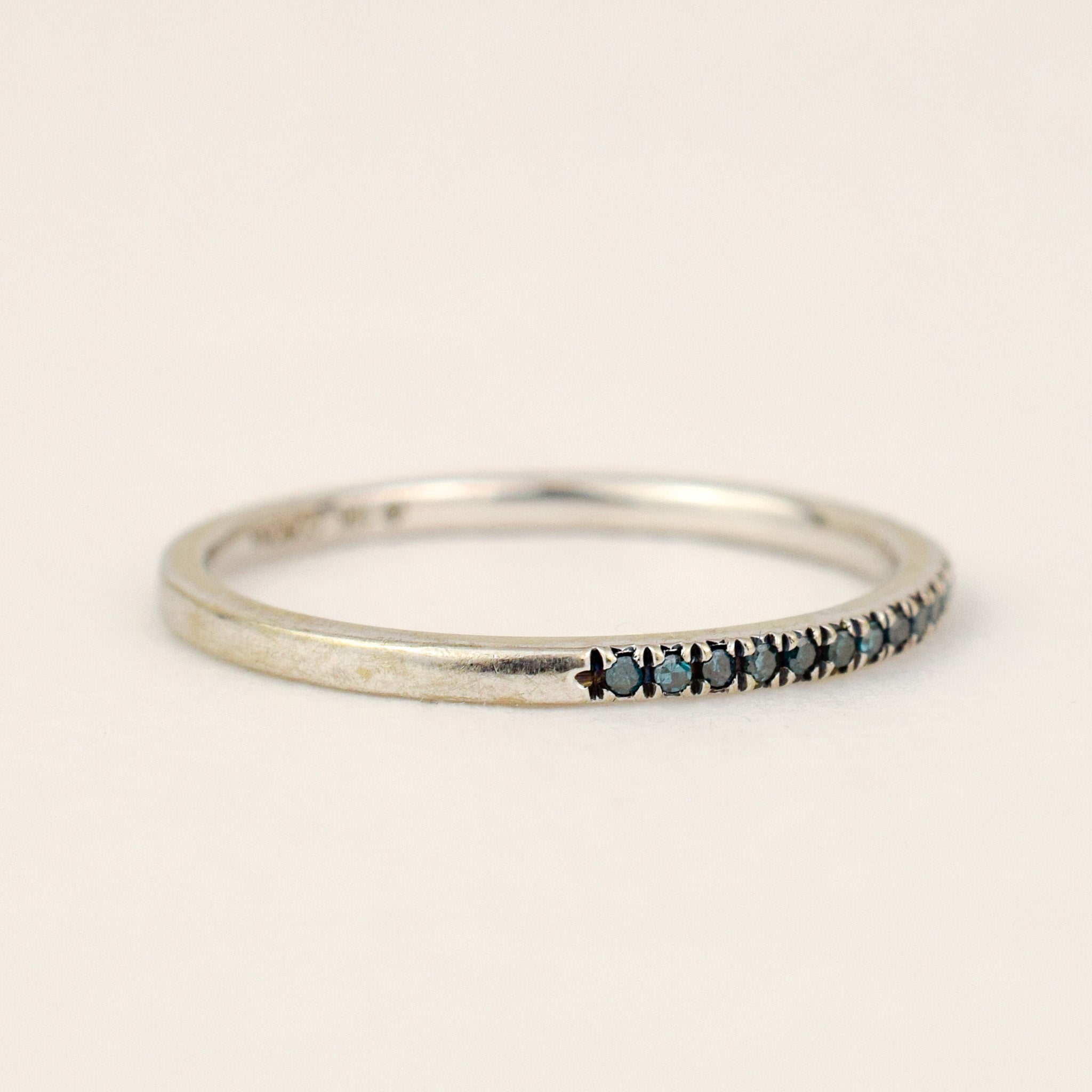 Blue Diamond Half Eternity Band, top-down view of the full row of pavé blue diamonds