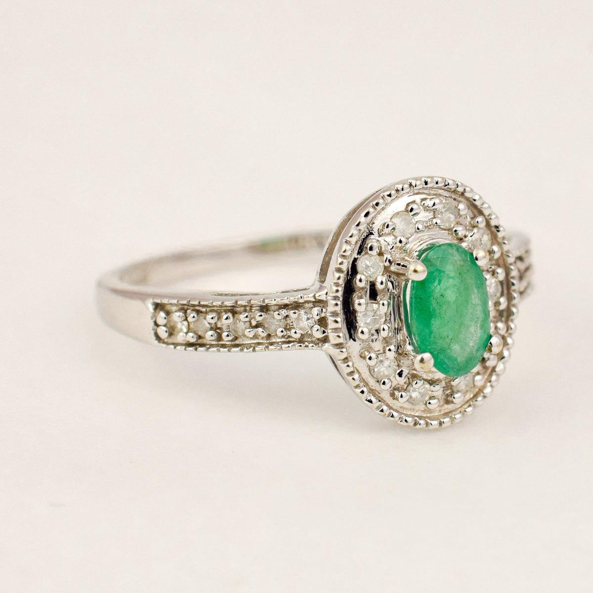 Emerald and Diamond Halo Ring