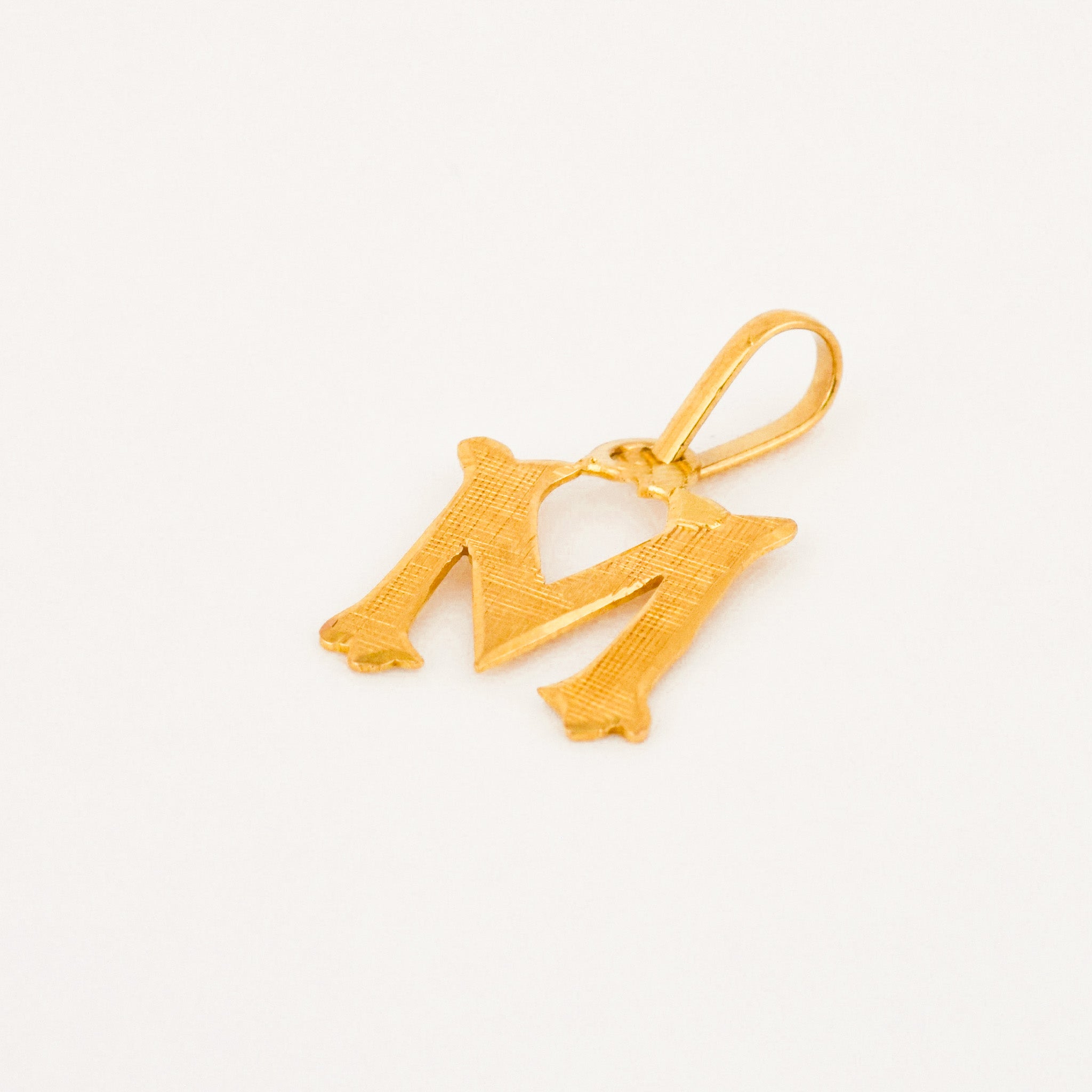 22k vintage gold 'm' charm pendant