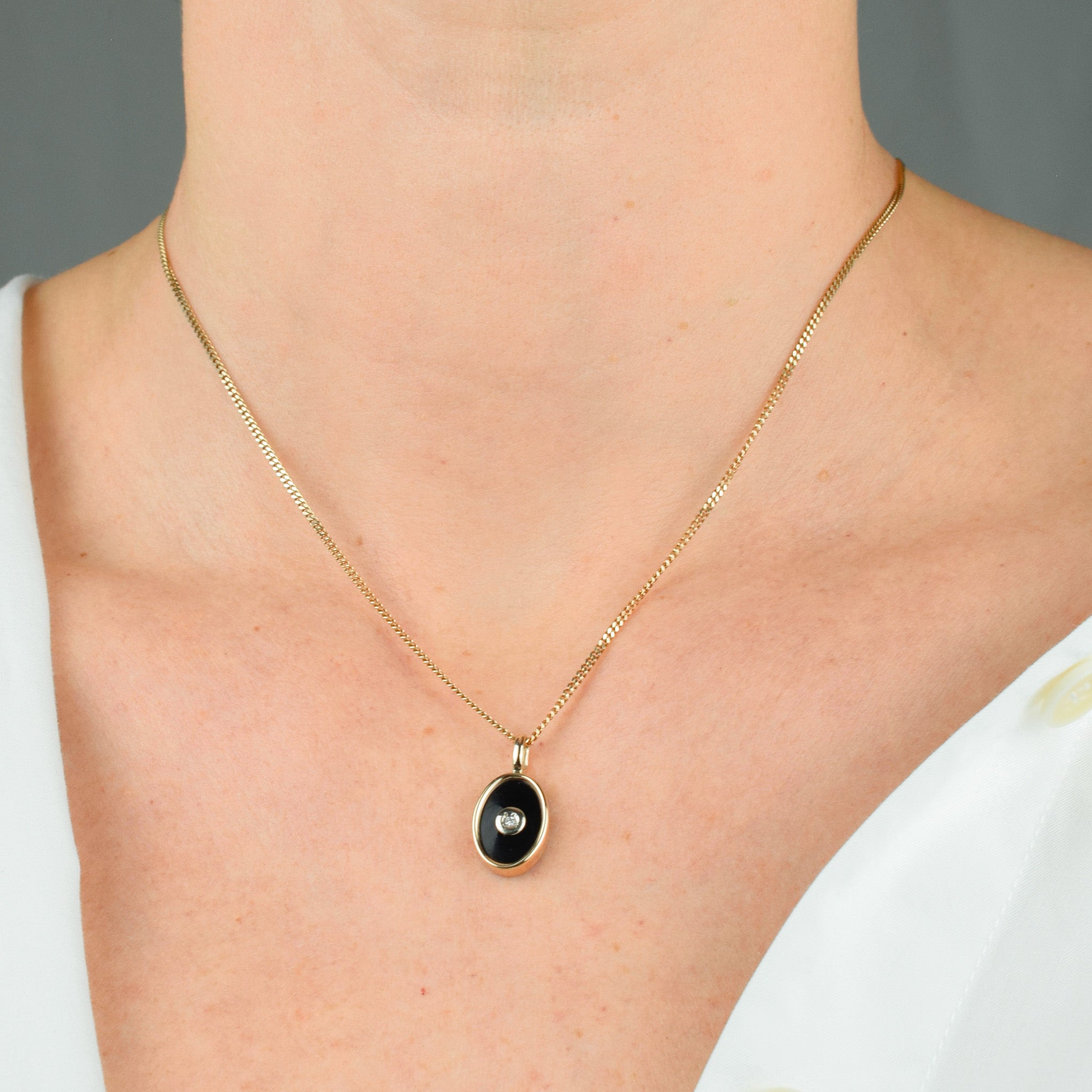 Onyx and Diamond Pendant