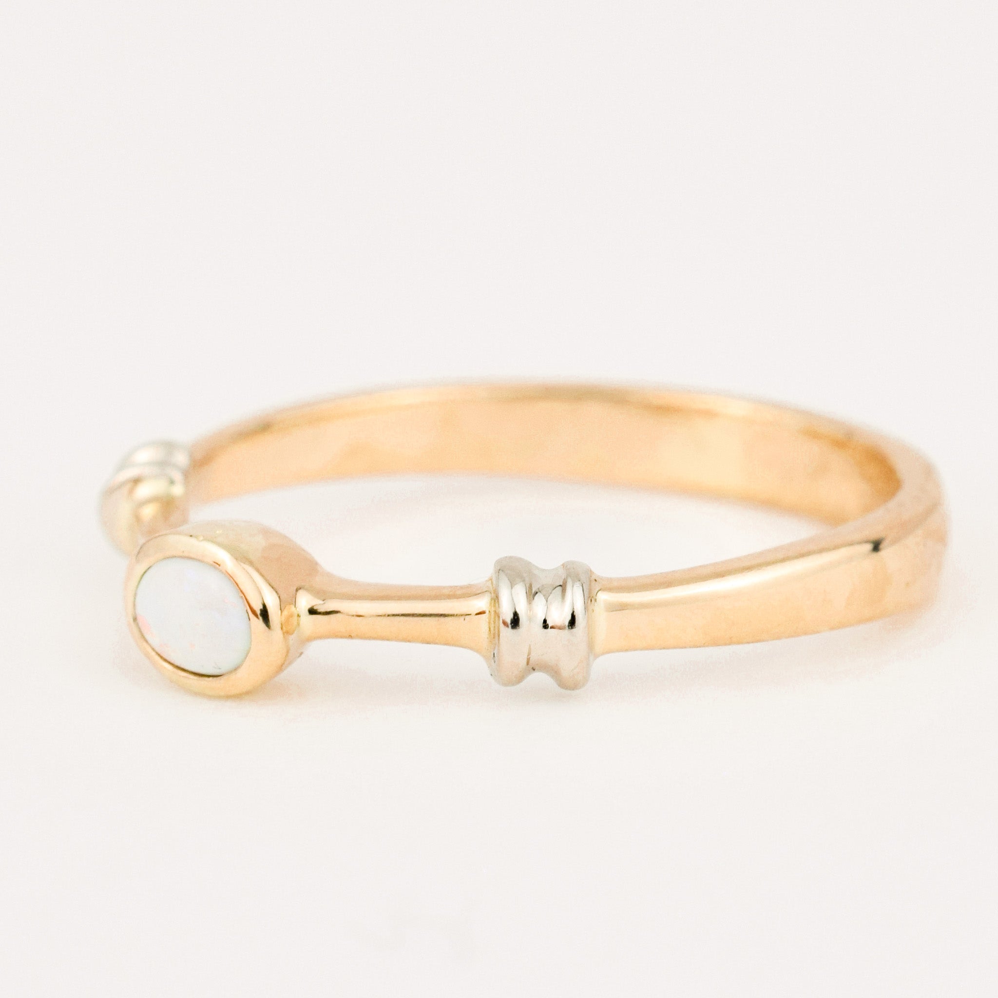 Bezel Set Opal Two Tone Gold Band