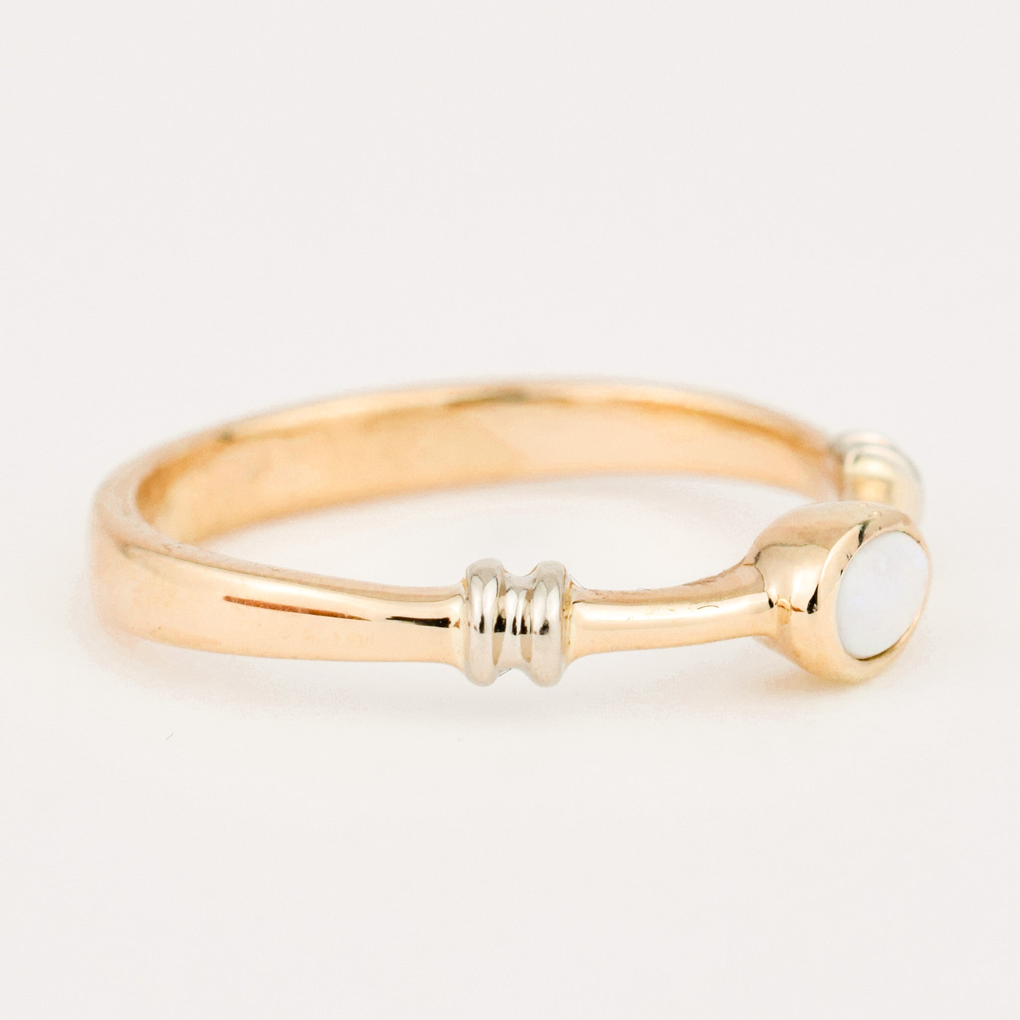 Bezel Set Opal Two Tone Gold Band