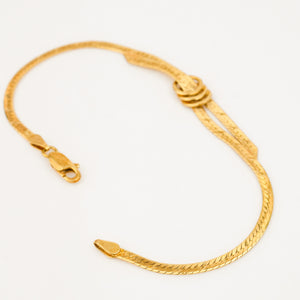 vintage 18k gold 7.25" Herringbone Bypass Bracelet