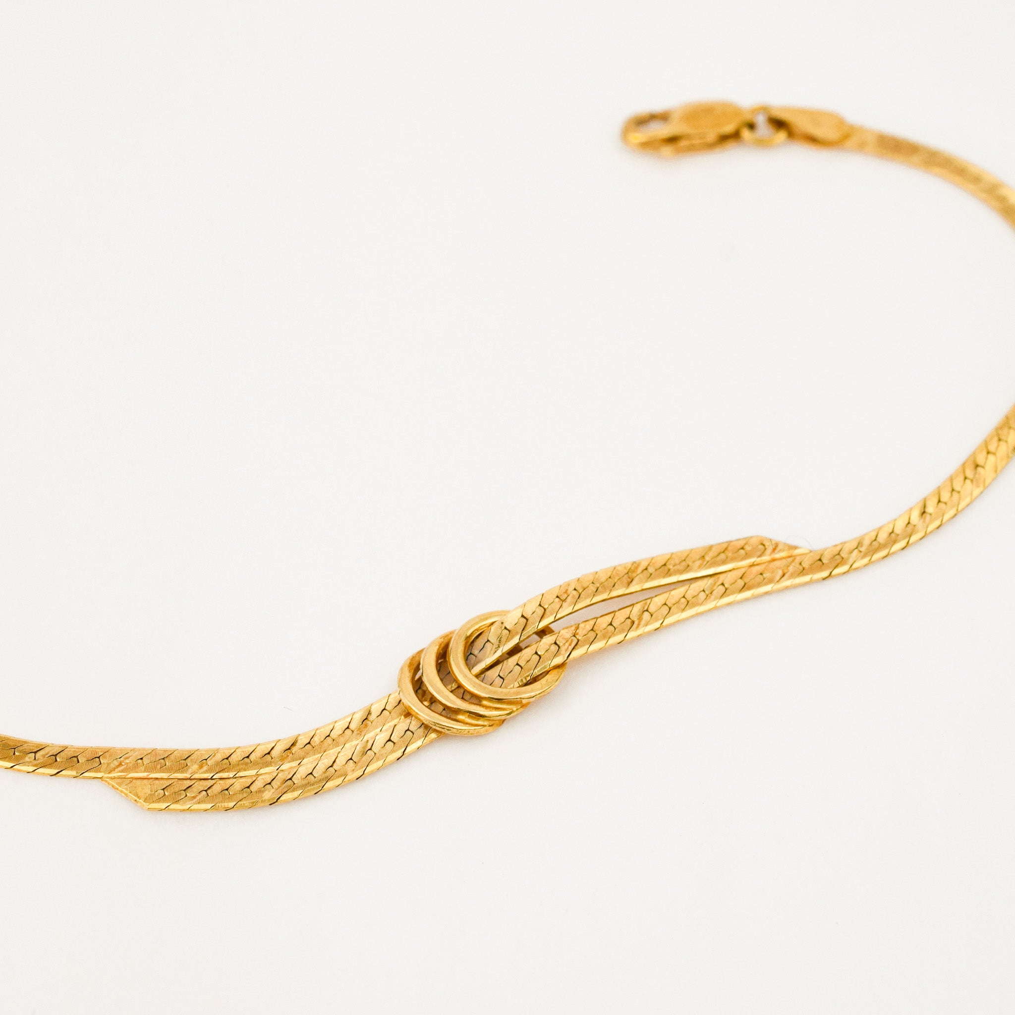 vintage 18k gold 7.25" Herringbone Bypass Bracelet