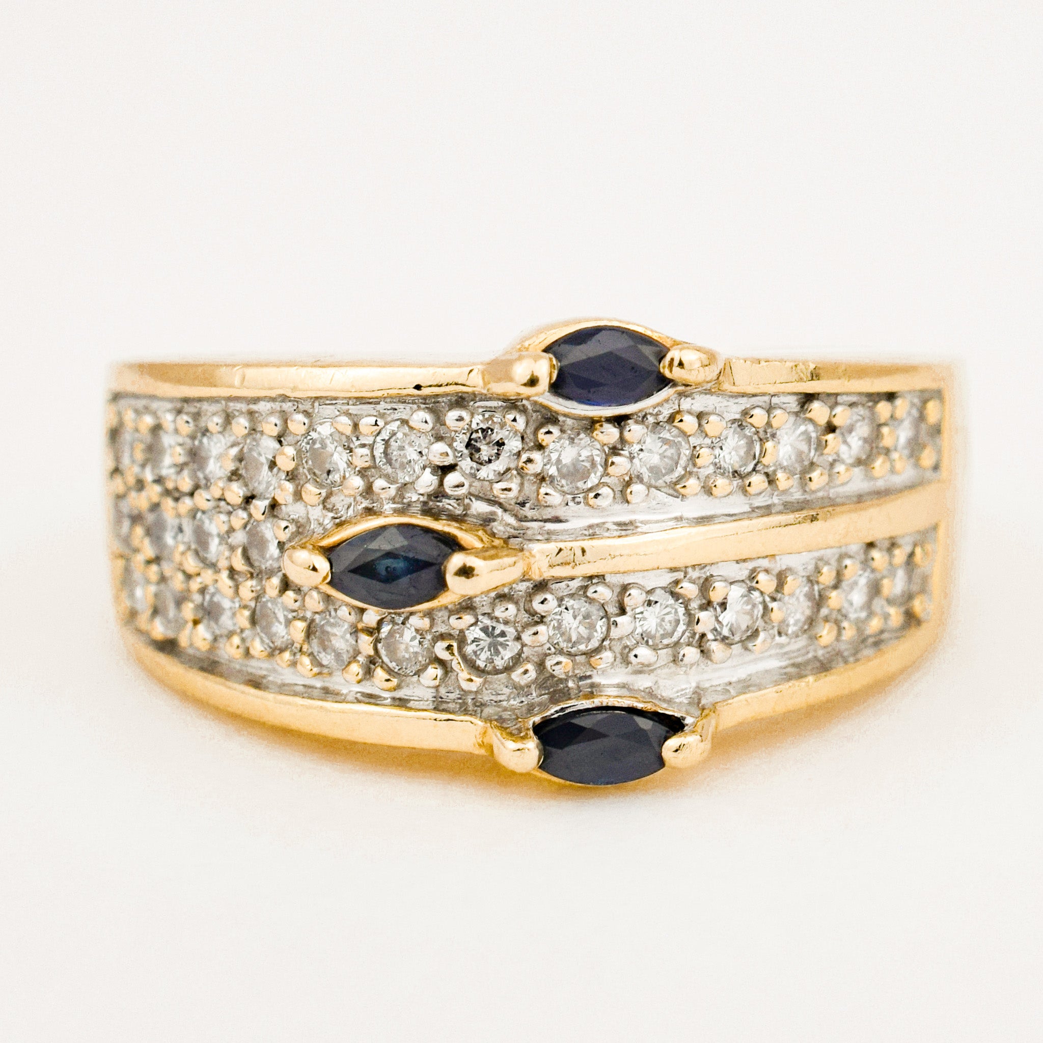 incredible sapphire and diamond wide gold ring 