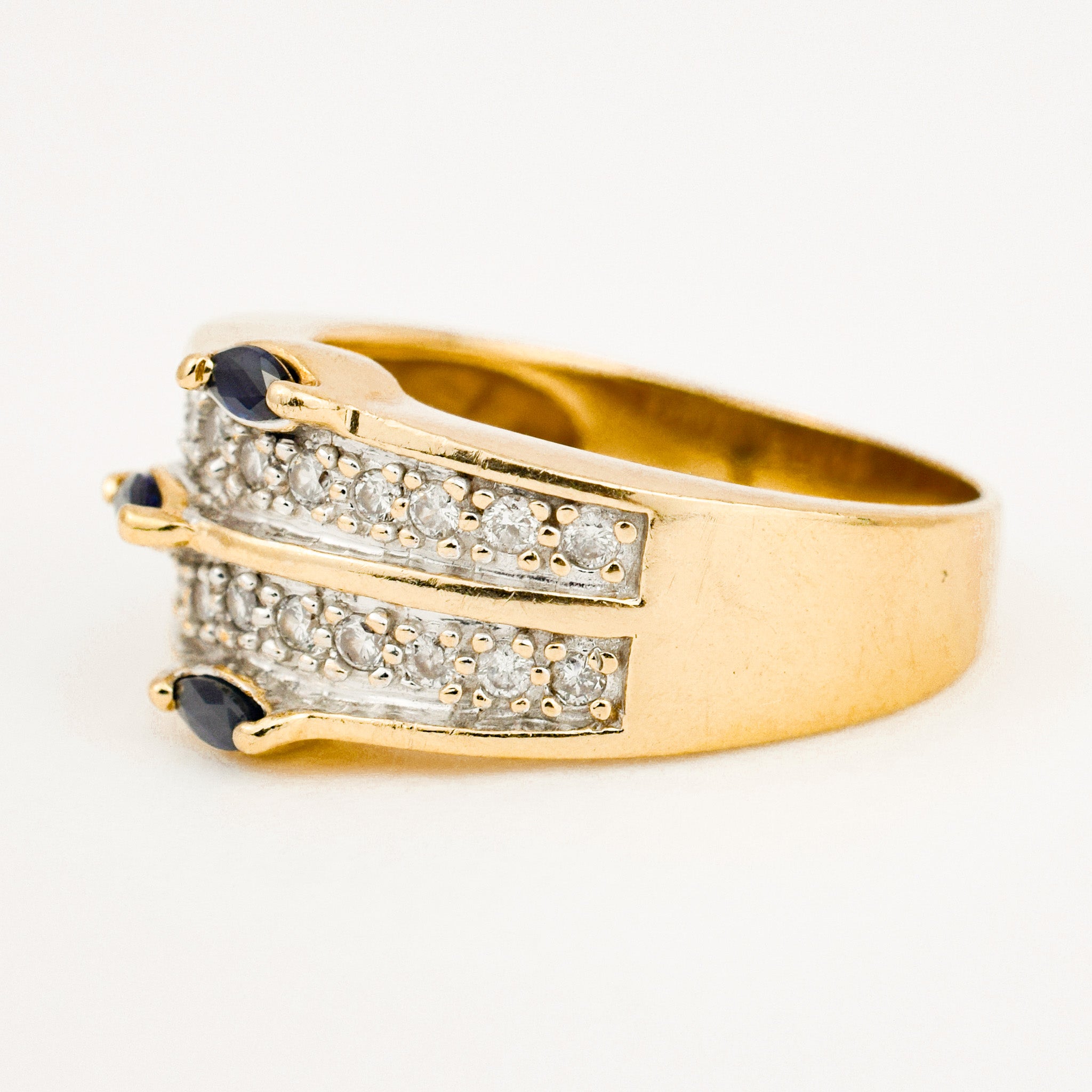 incredible sapphire and diamond wide gold ring 