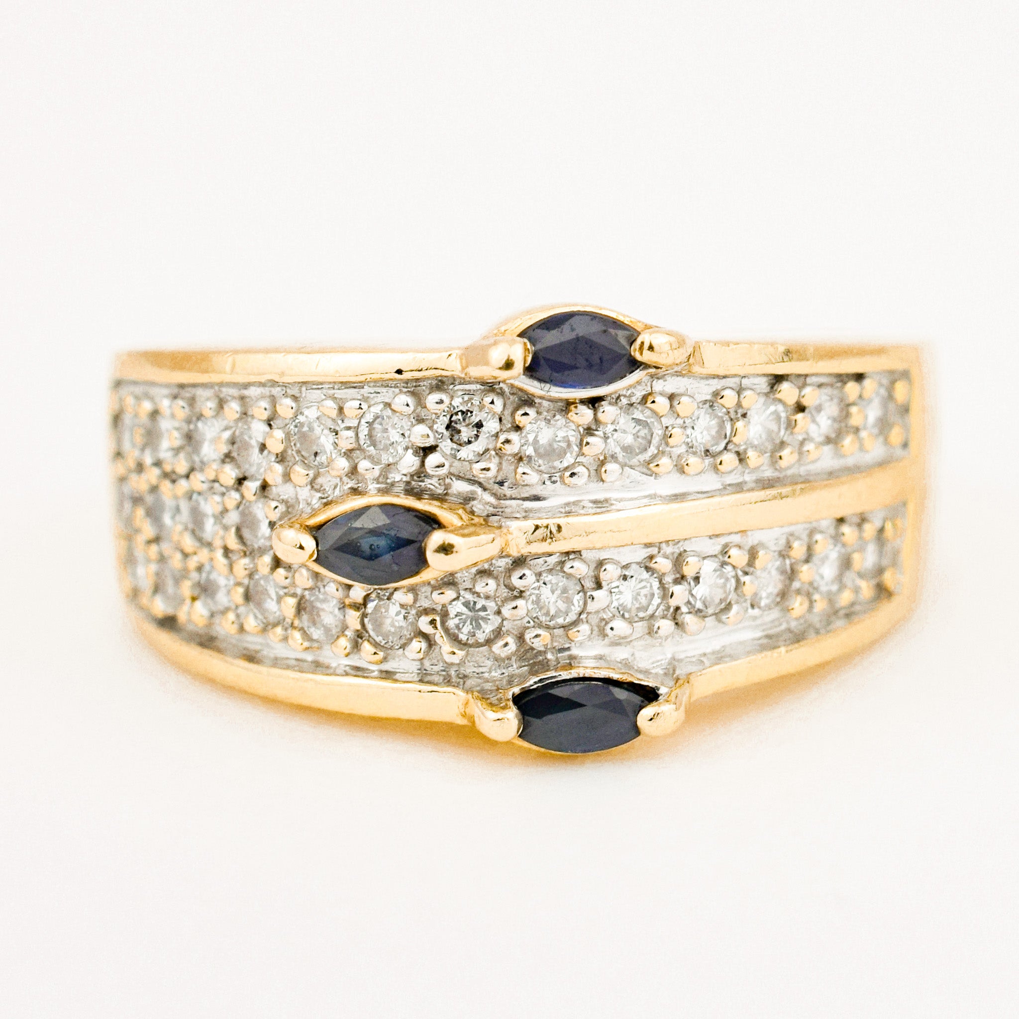 incredible sapphire and diamond wide gold ring 