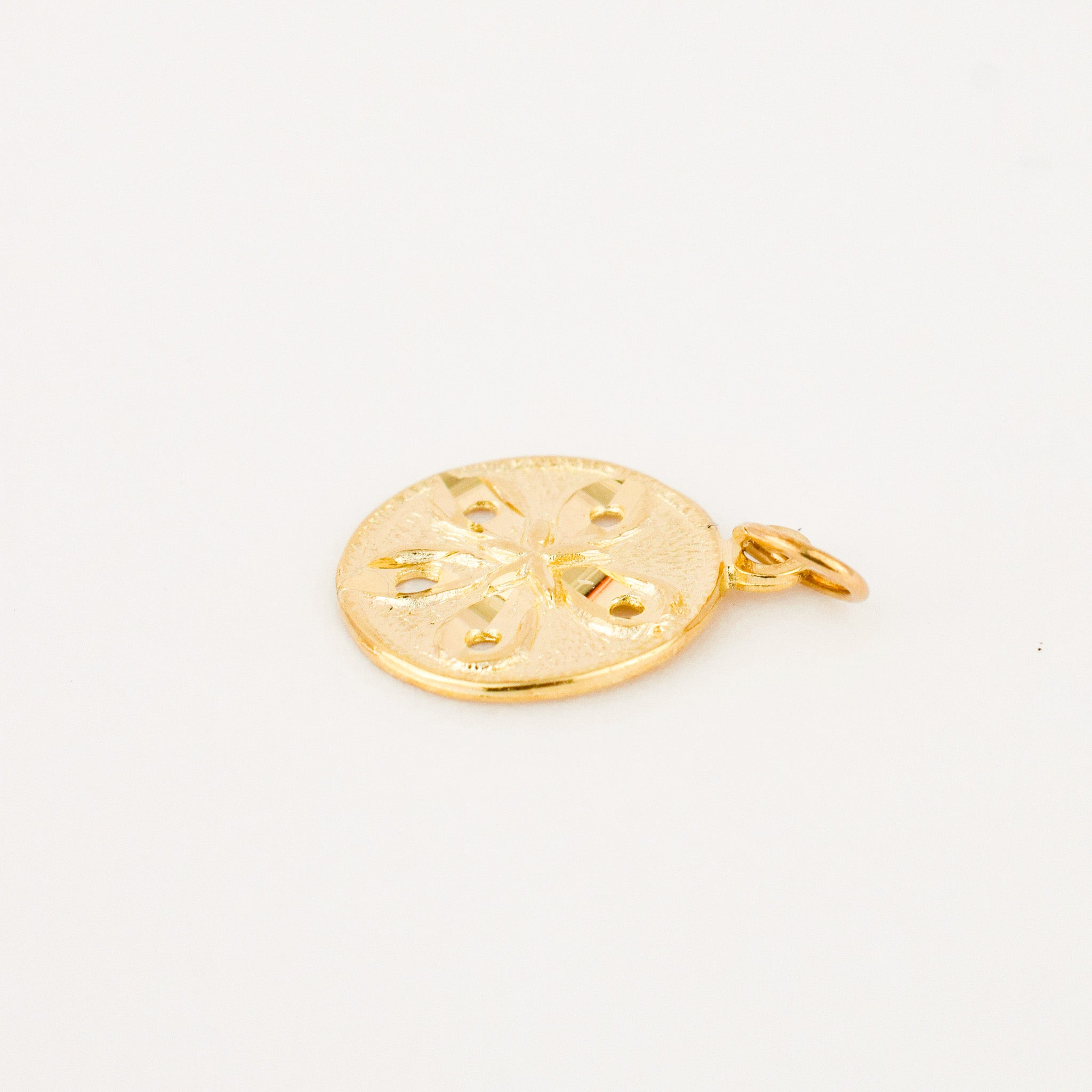 vintage gold sand dollar charm 