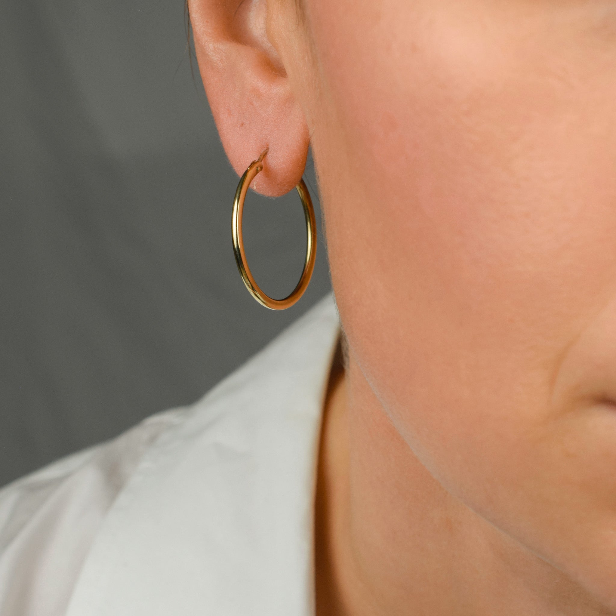 vintage gold tubular hoop earrings