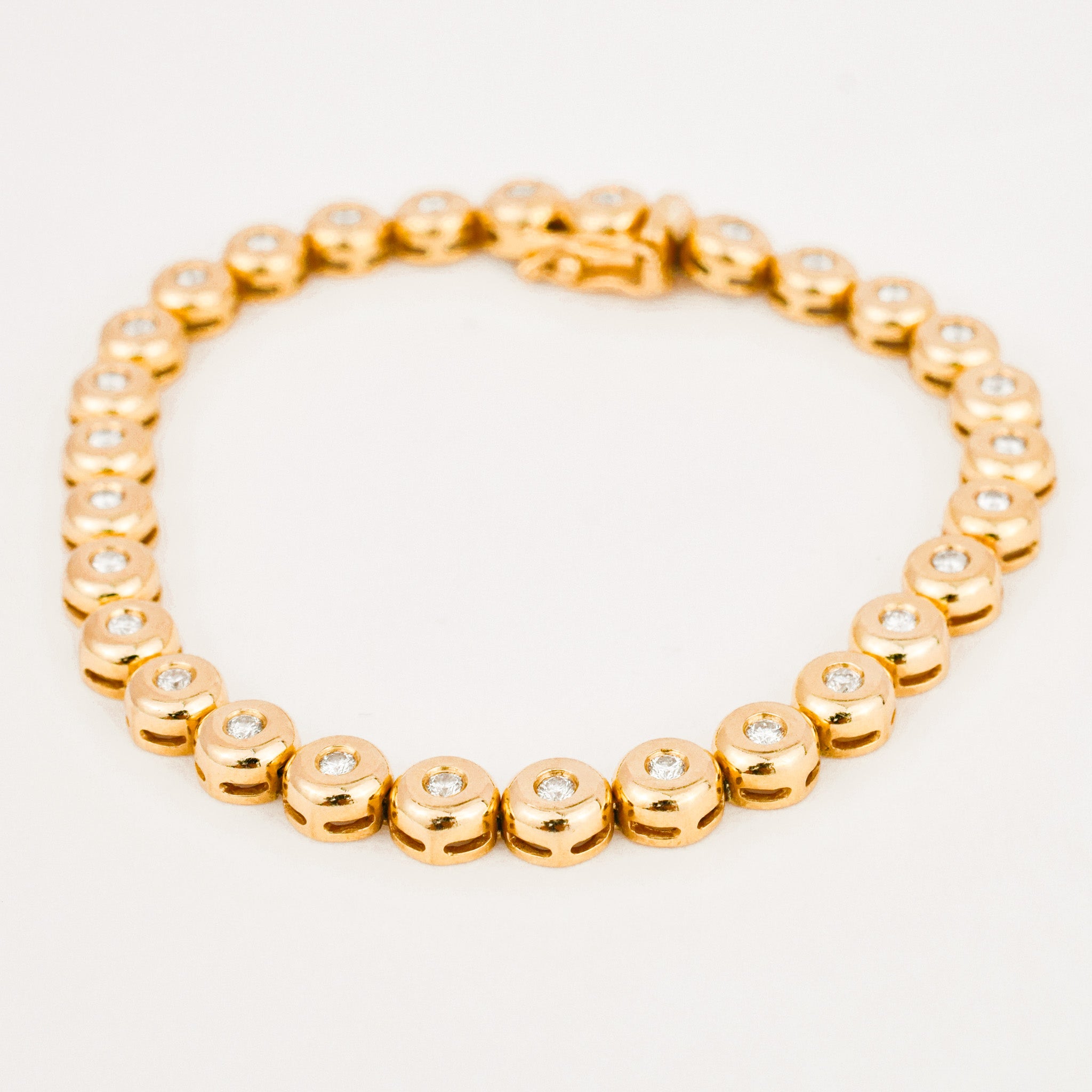 vintage yellow gold bezel set diamond tennis bracelet 