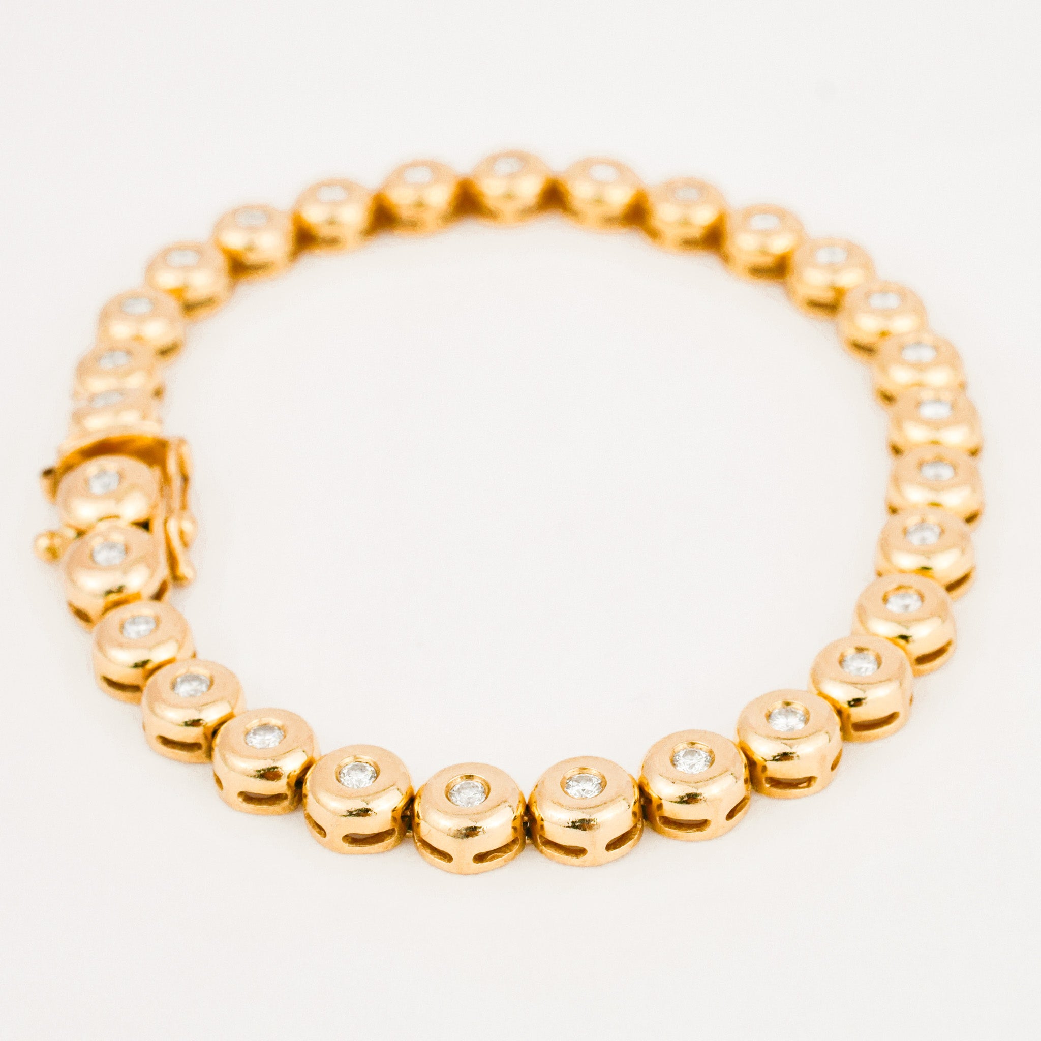 vintage yellow gold bezel set diamond tennis bracelet 