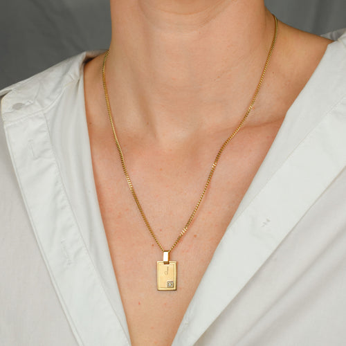 vintage gold 'j' dog tag pendant