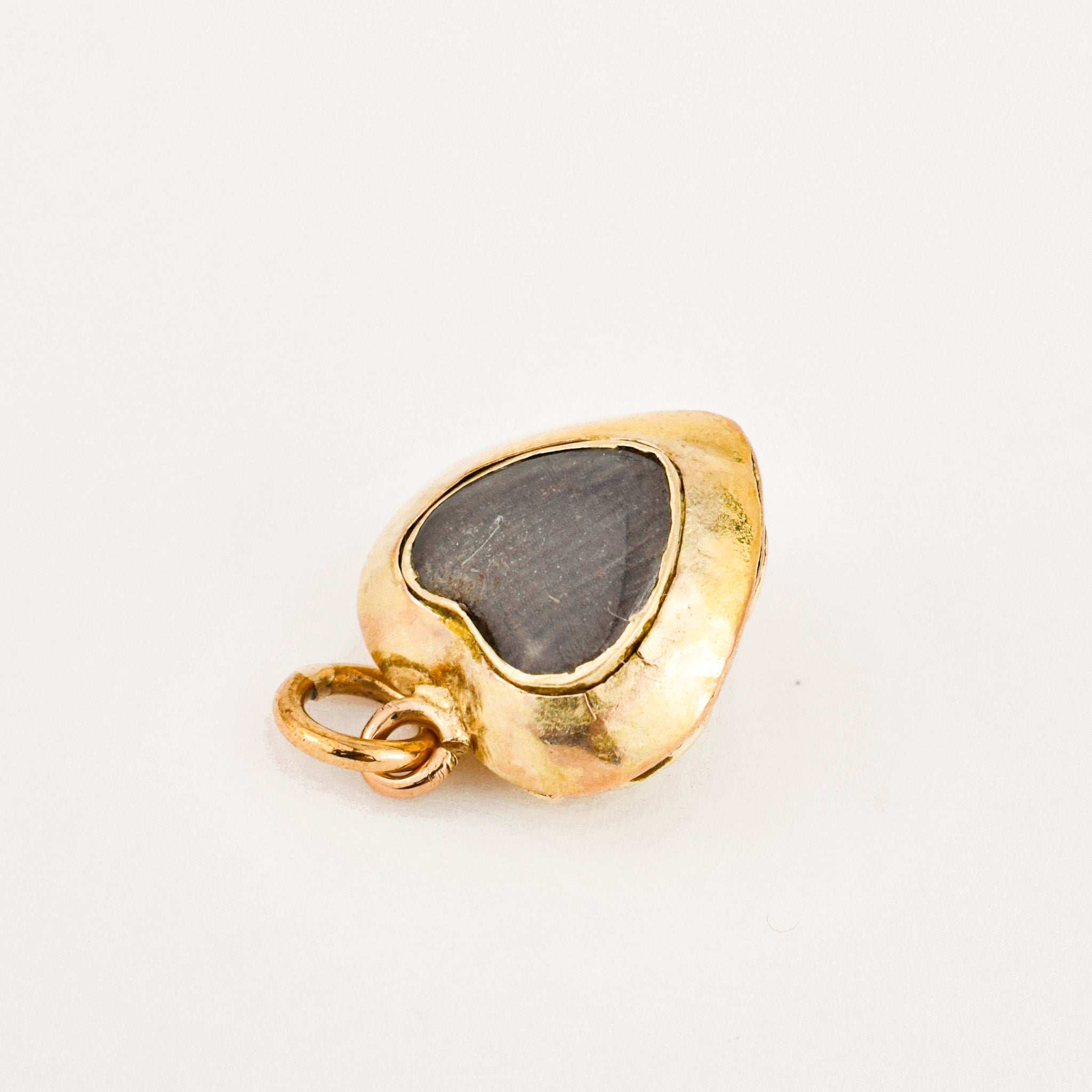 antique heart mourning locket with emerald stone