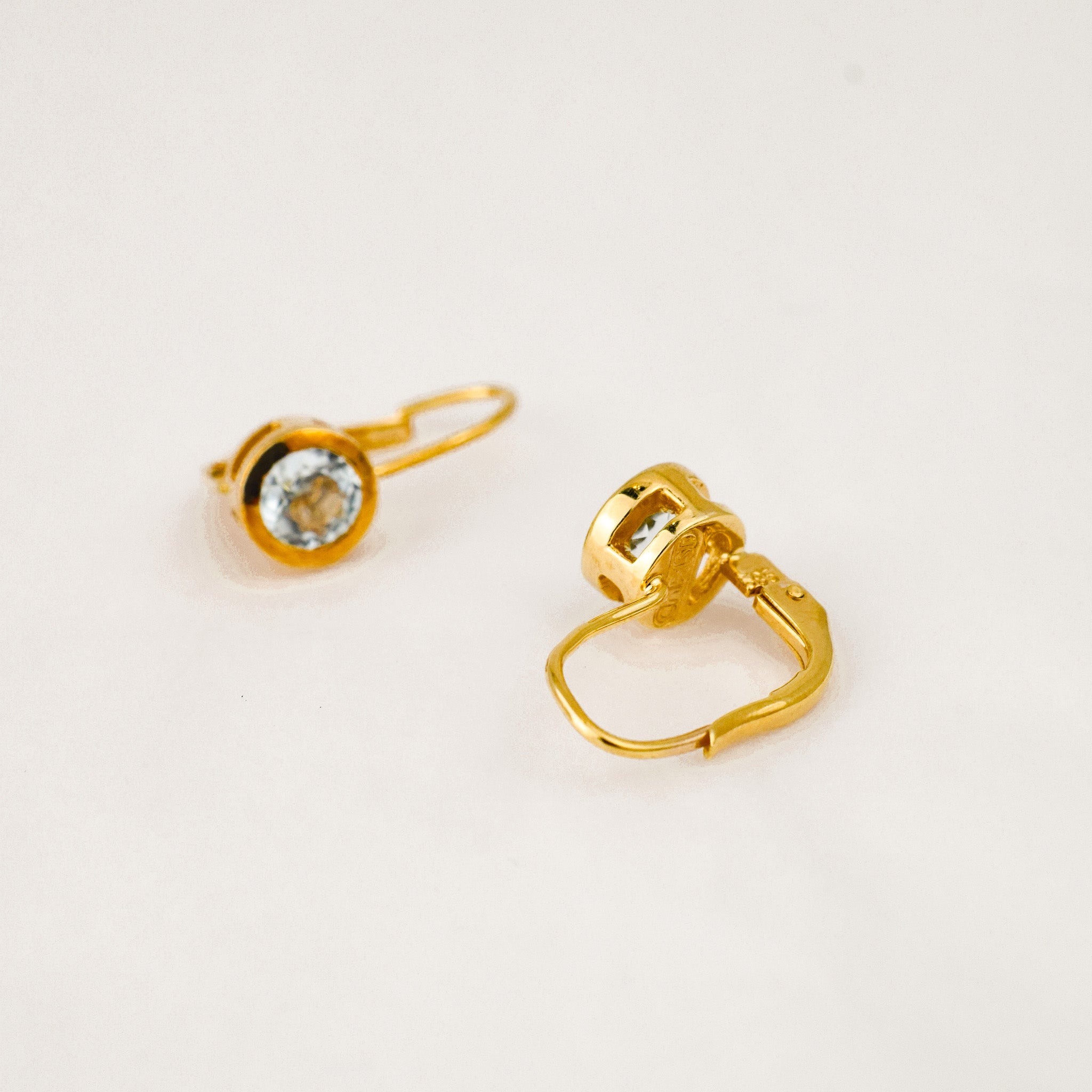 Vintage gold bezel set blue stone drop hoop earrings 