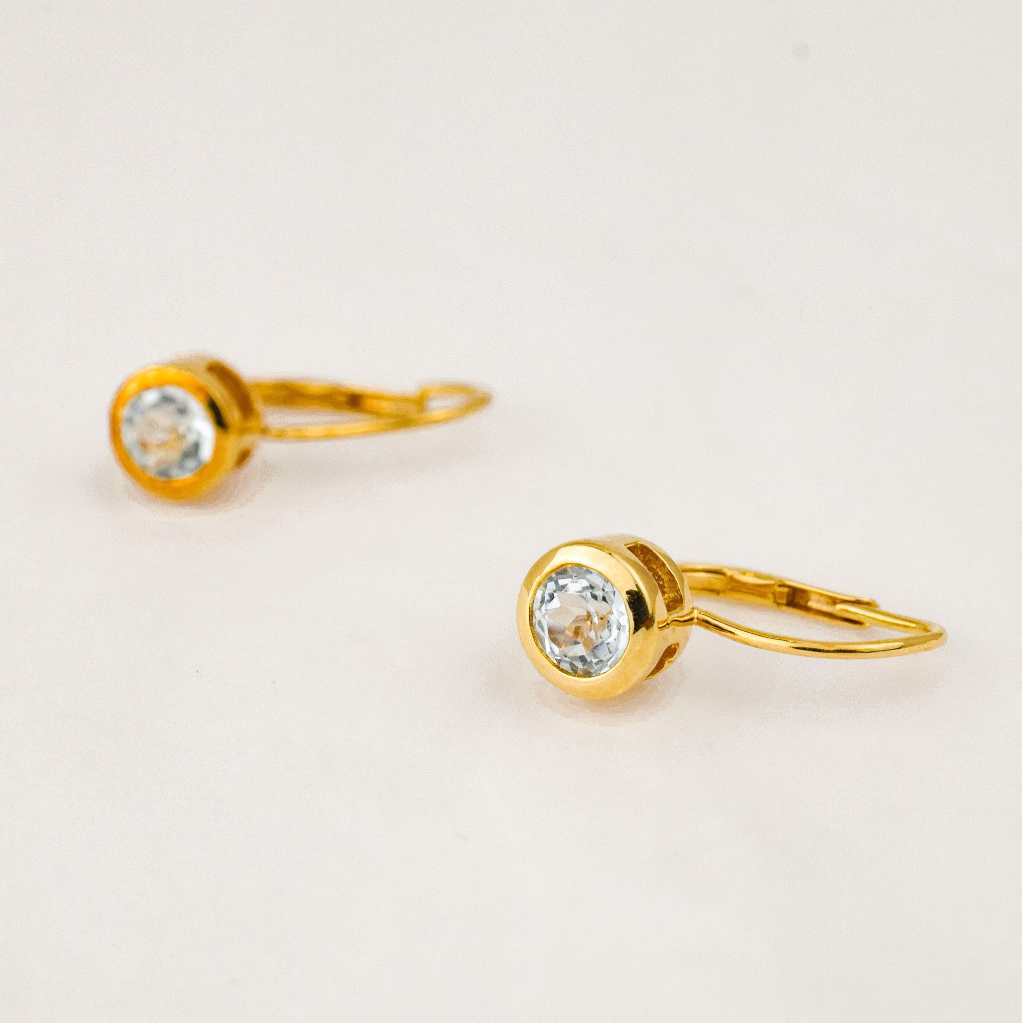 Vintage gold bezel set blue stone drop hoop earrings 