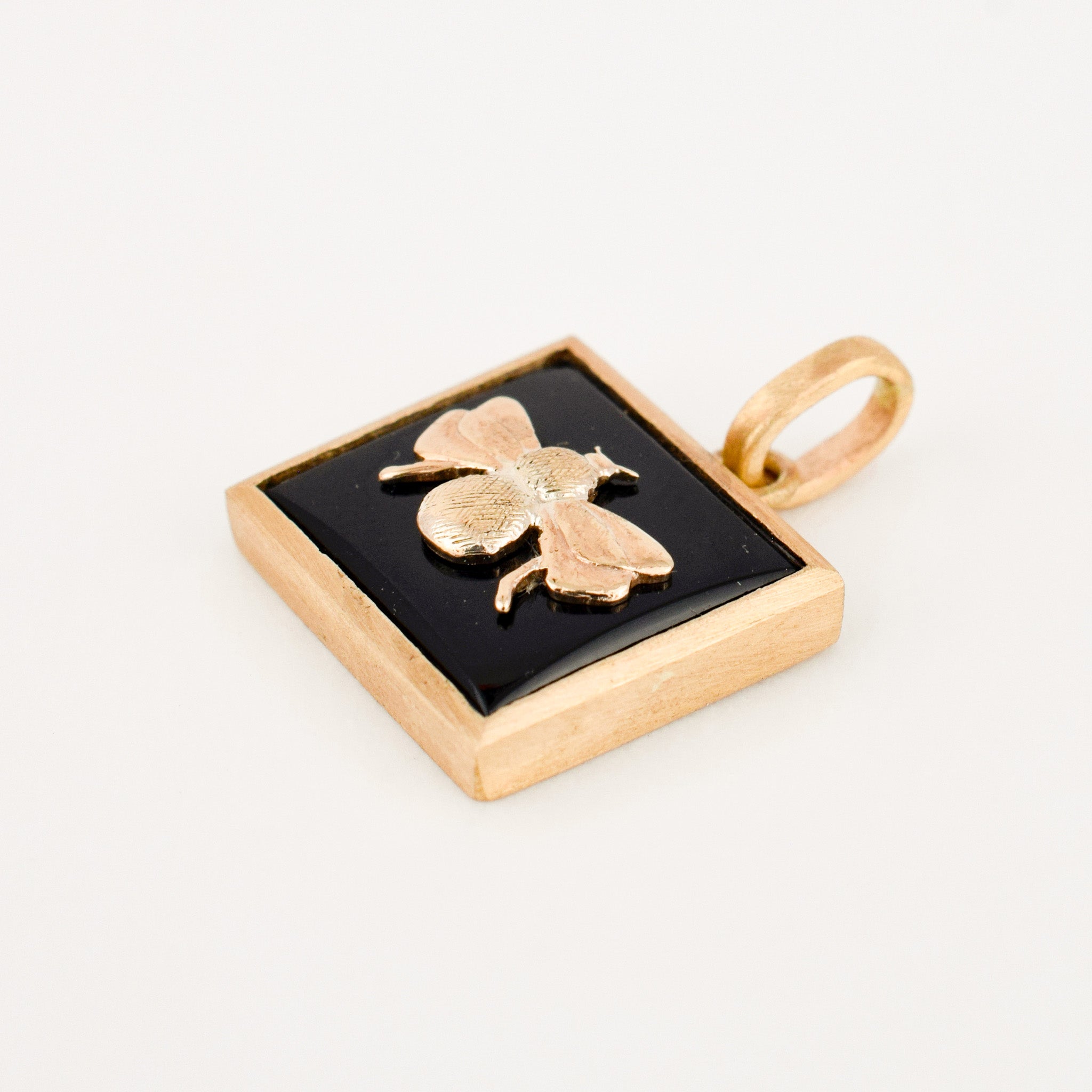 Bezel Set Onyx and Gold Bee Pendant