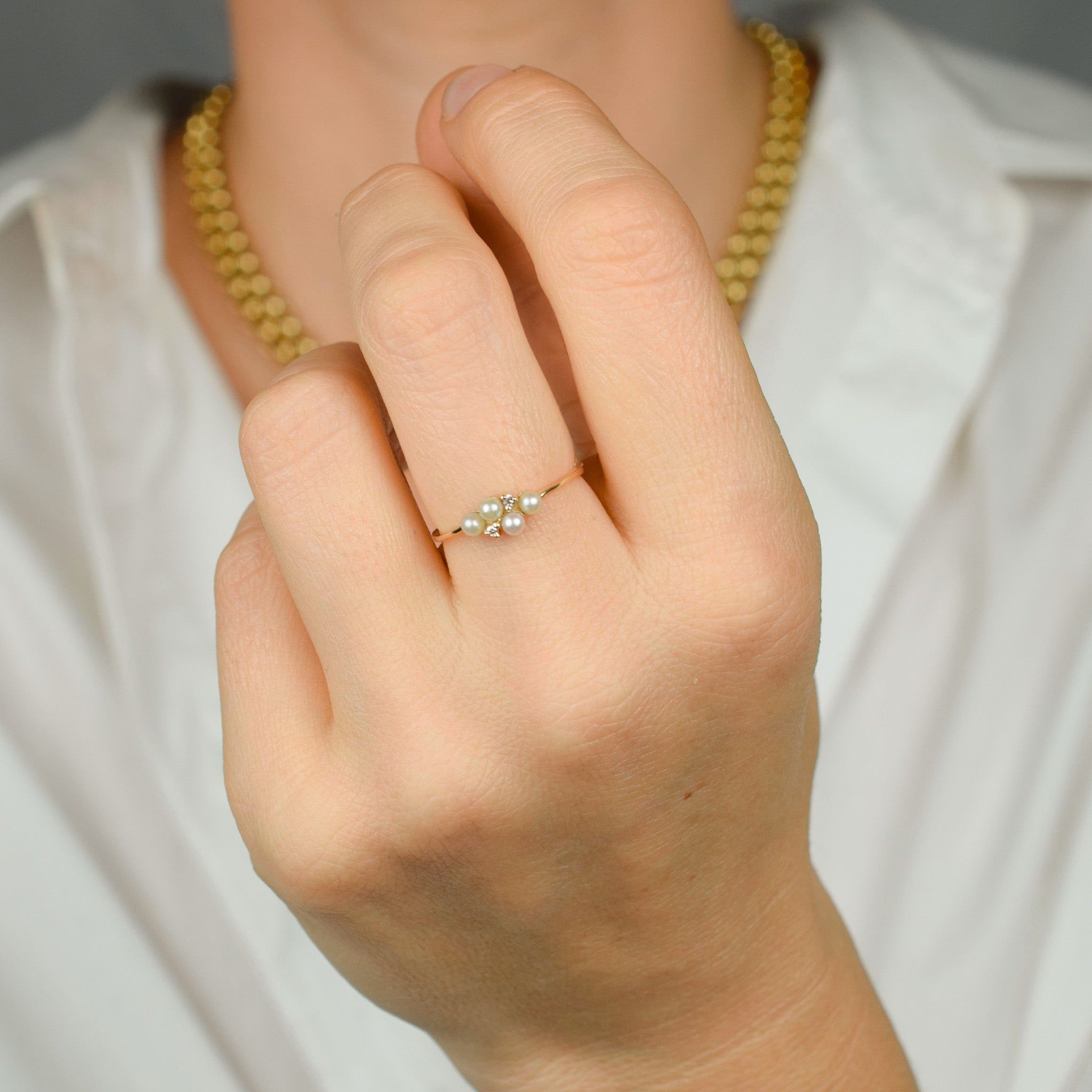 dainty vintage pearl and diamond ring