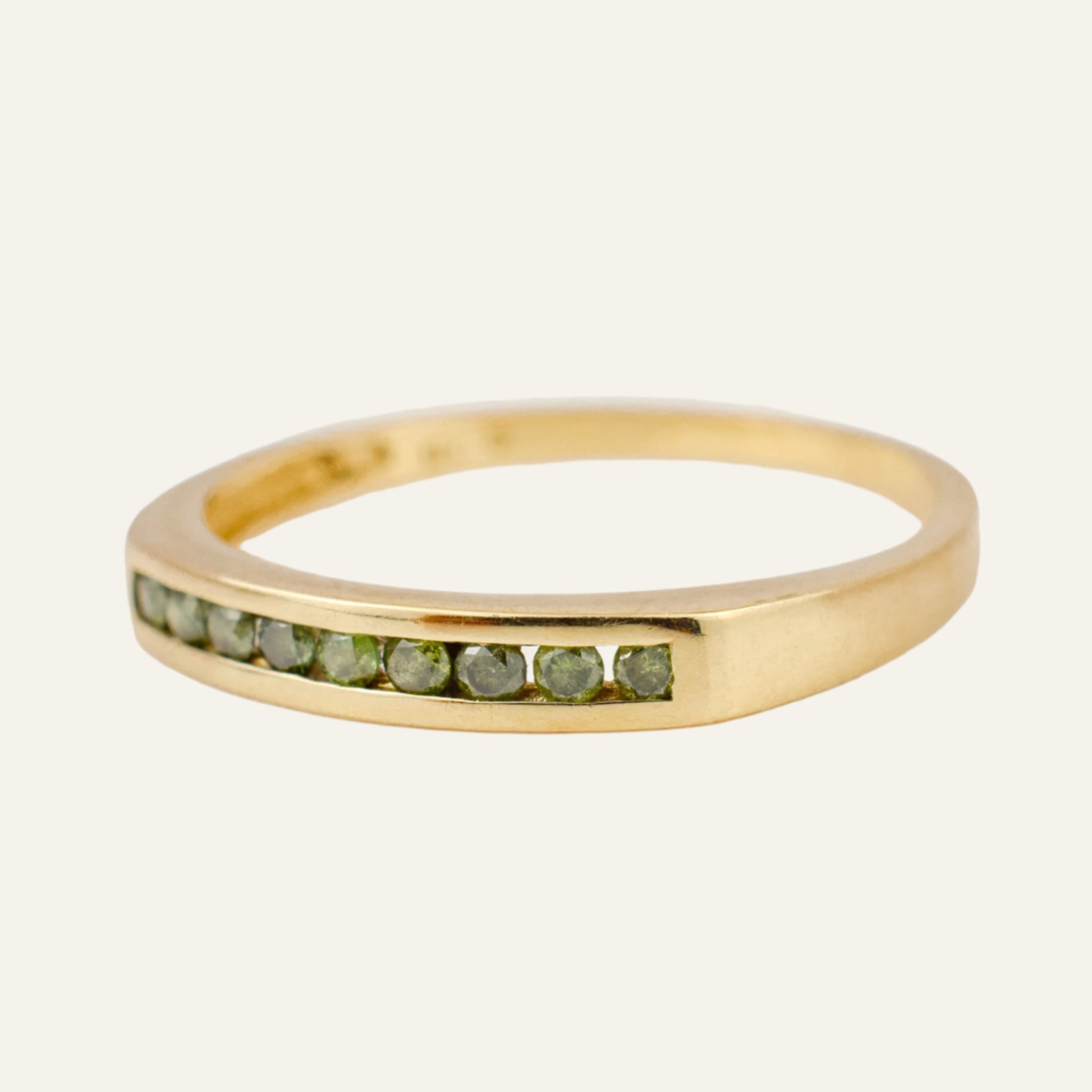 Green Sapphire Channel Set Gold Band