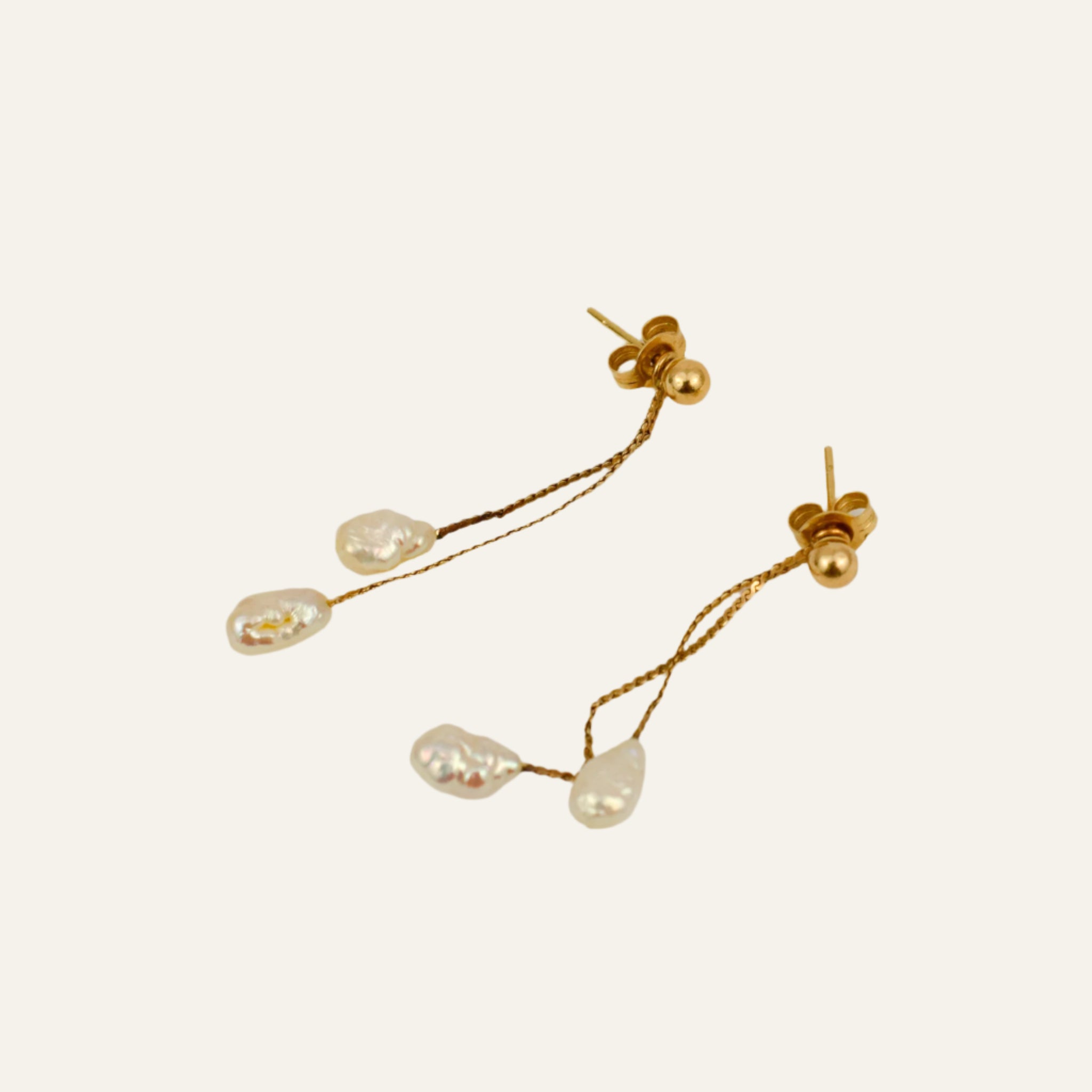 Dangling Seed Pearl Studs