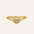Gold ring with a triangular design on a light gray background