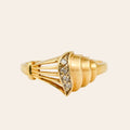 Sculptural Shell and Diamond Ring in 10k yellow gold, front view of the conch shell form set with five small diamonds