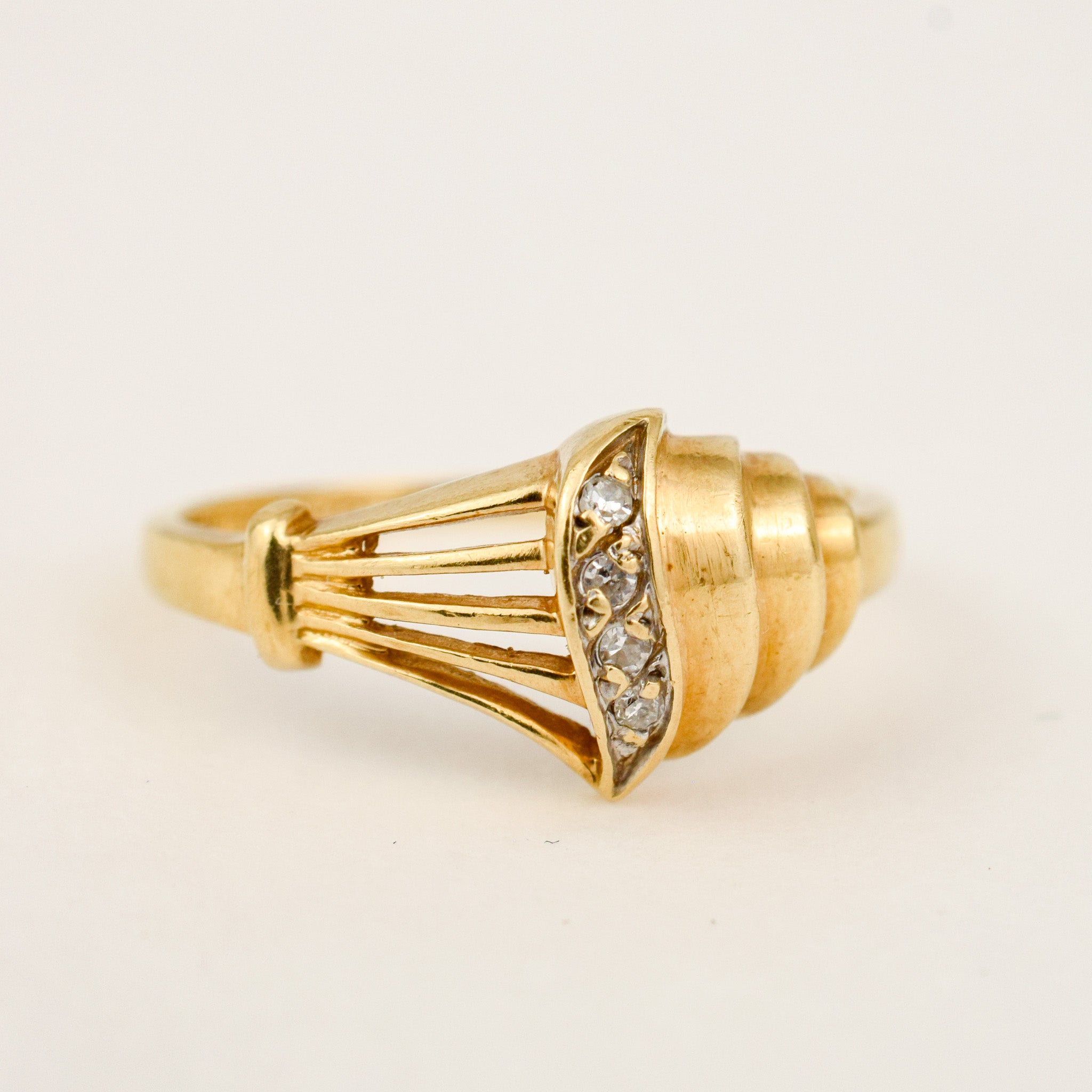 Sculptural Shell and Diamond Ring, profile view showing the depth of the sculpted shell setting