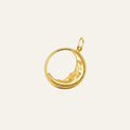 10k yellow gold crescent moon pendant with a sleeping face, curve nestled inside an open circle