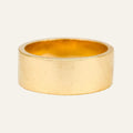 Wide flat high-polished 10k yellow gold cigar band with soft surface patina