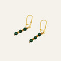 Vintage 14k gold leverback earrings with graduated malachite beads and gold spacers.