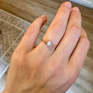 Diamond engagement ring with 2025 opal accents