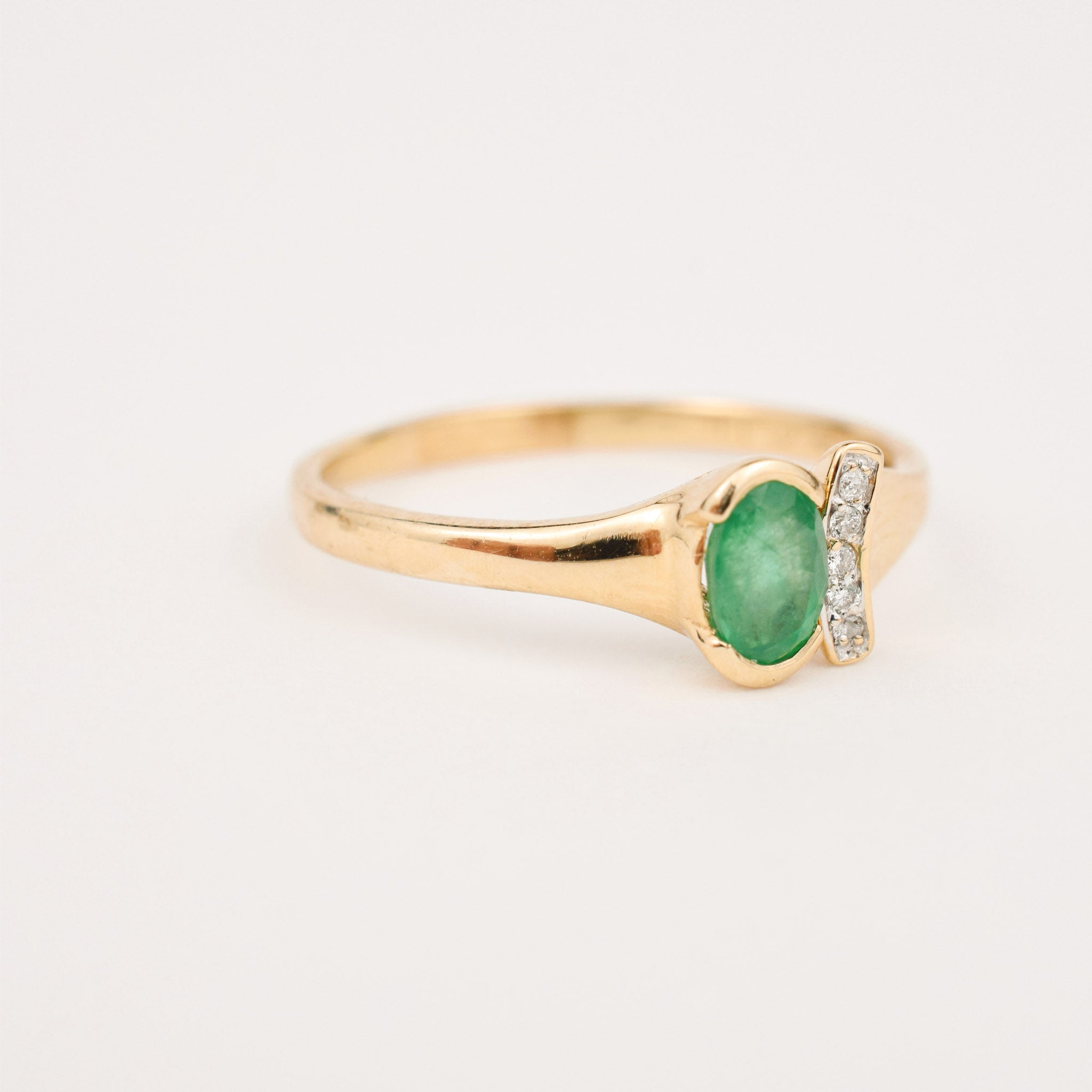 special occasion bezel set Emerald and Diamond ring