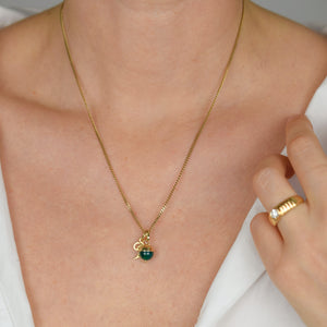 'T' Charm