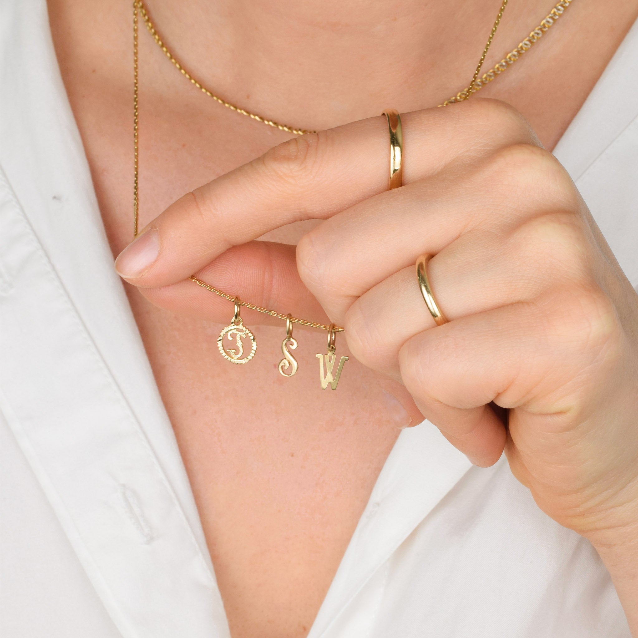 gold 'W' Charm pendant