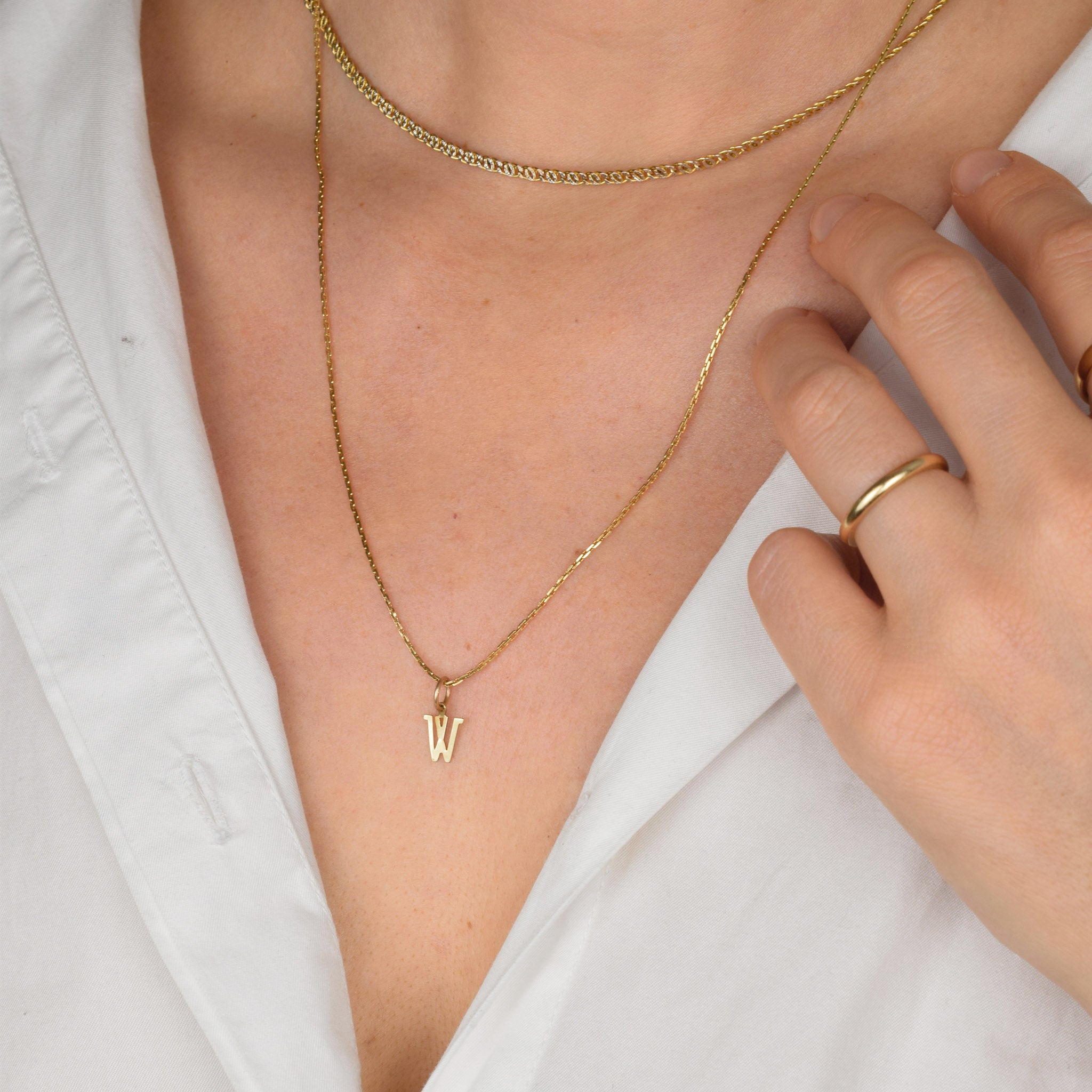 gold 'W' Charm pendant