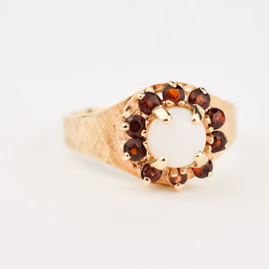 gold Opal Ring with Garnet Halo 