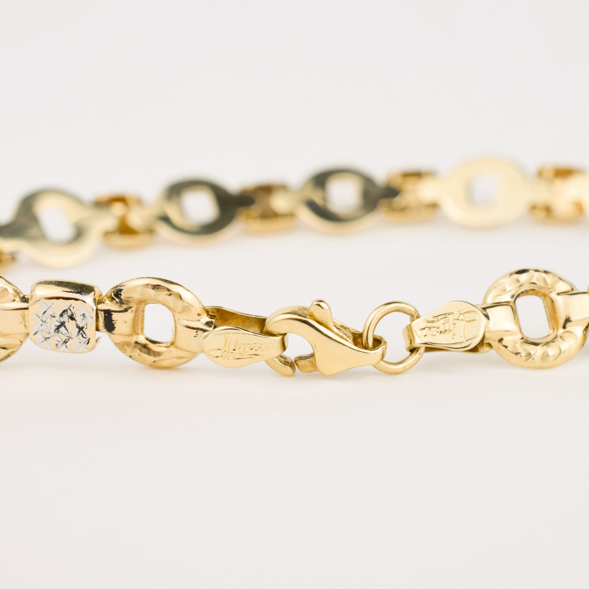 7" Diamond Cut two toned gold Bit Bracelet 