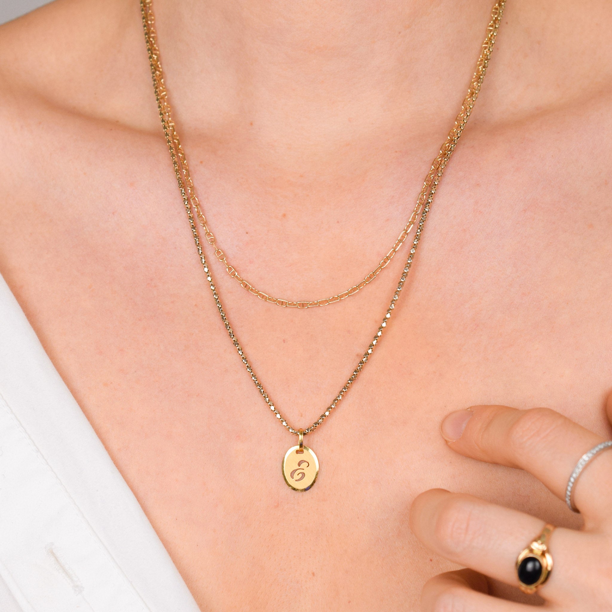 'e' gold charm pendant 