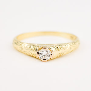 antique diamond ring with intricate detailing