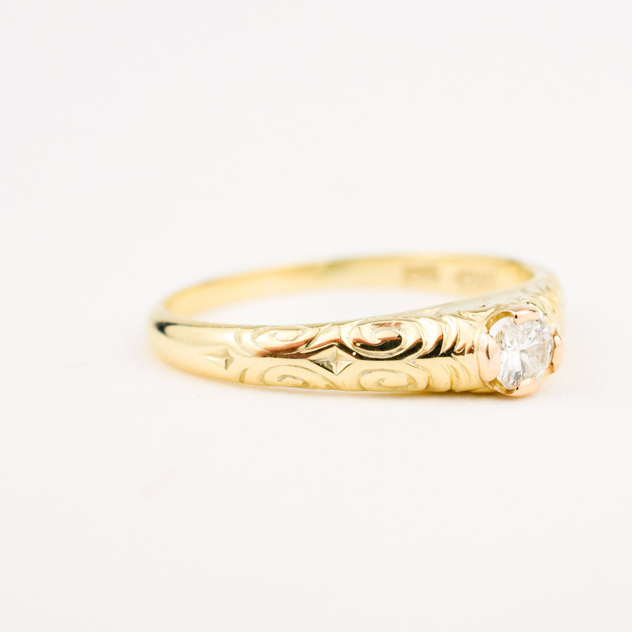 antique diamond ring with intricate detailing