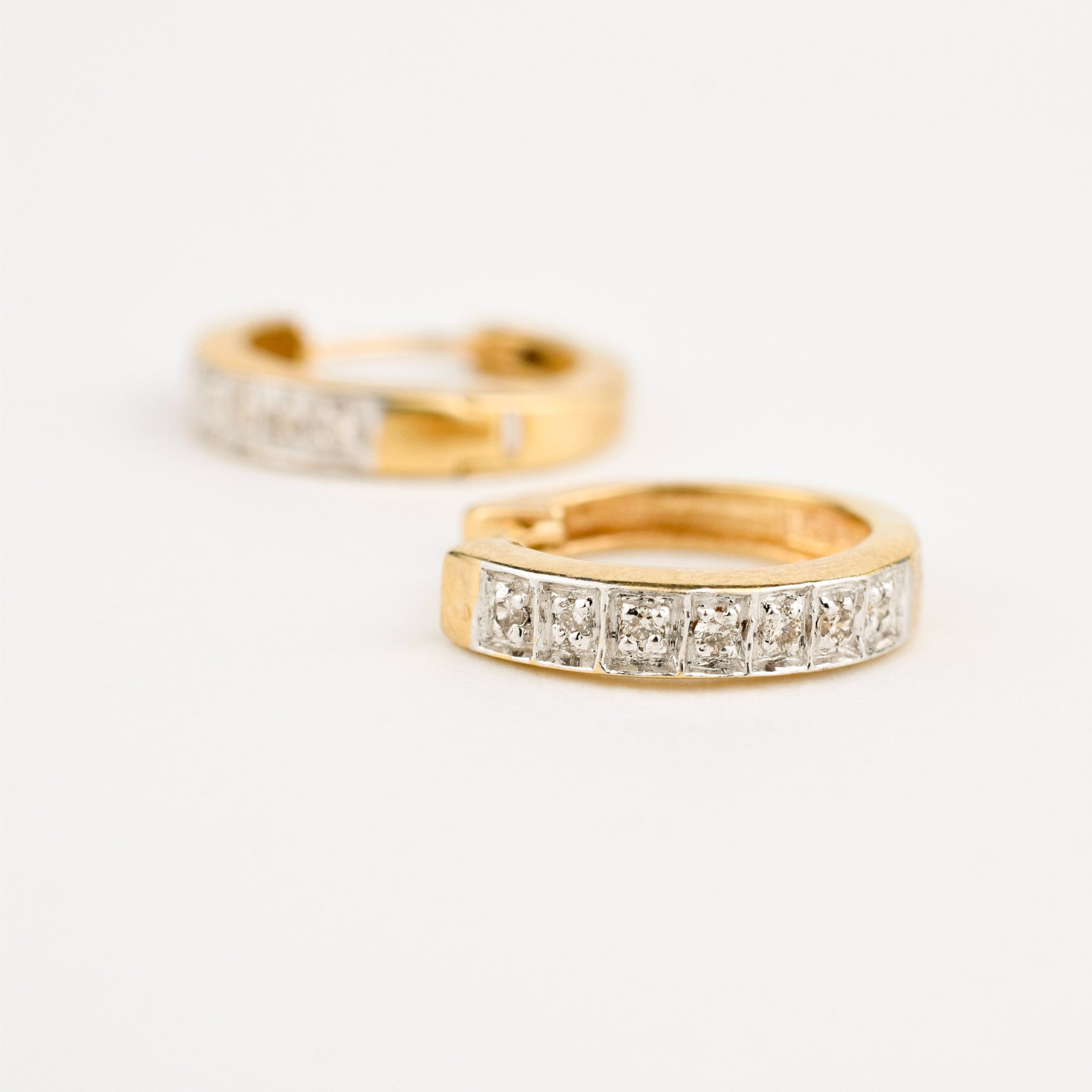 yellow gold diamond huggie hoop earrings