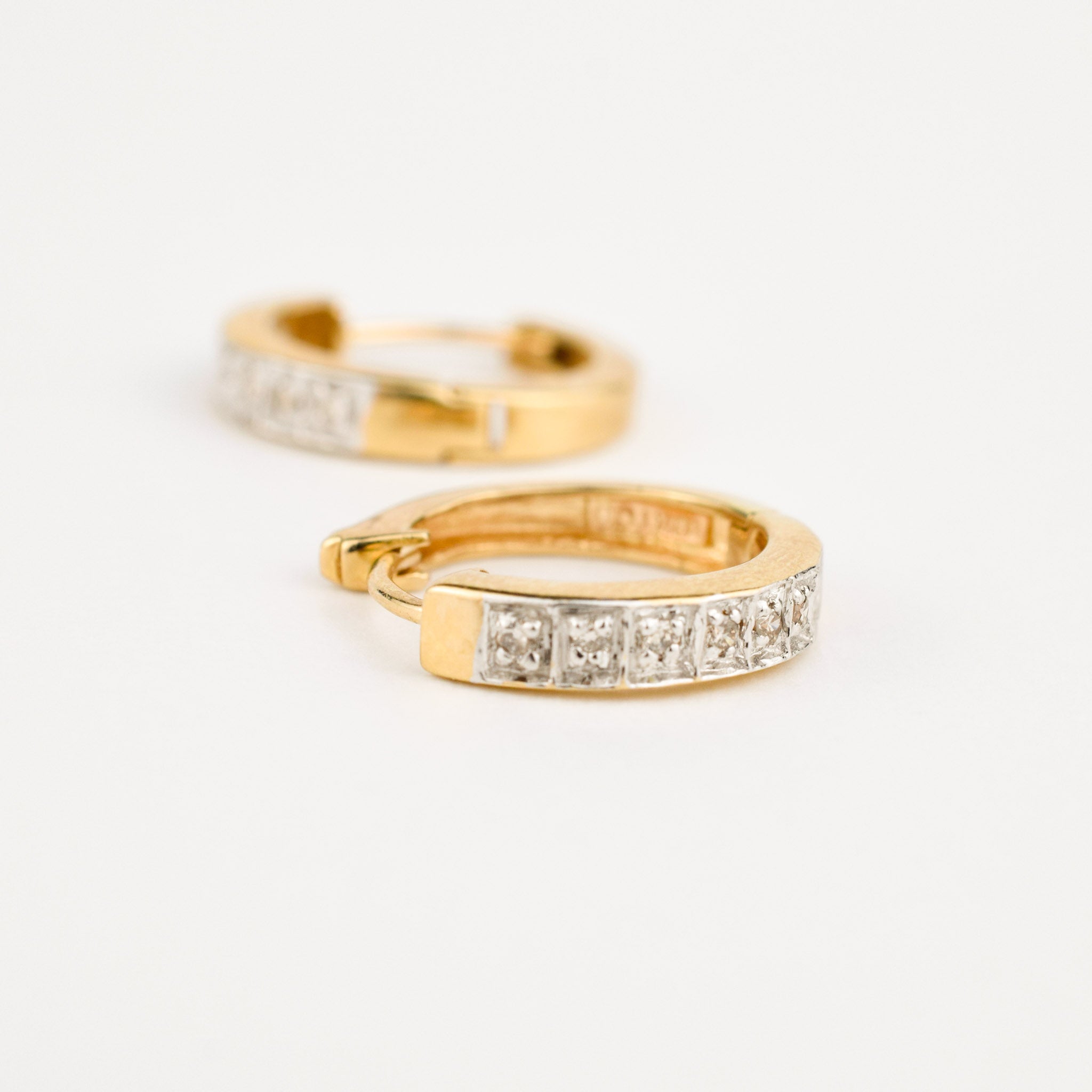yellow gold diamond huggie hoop earrings