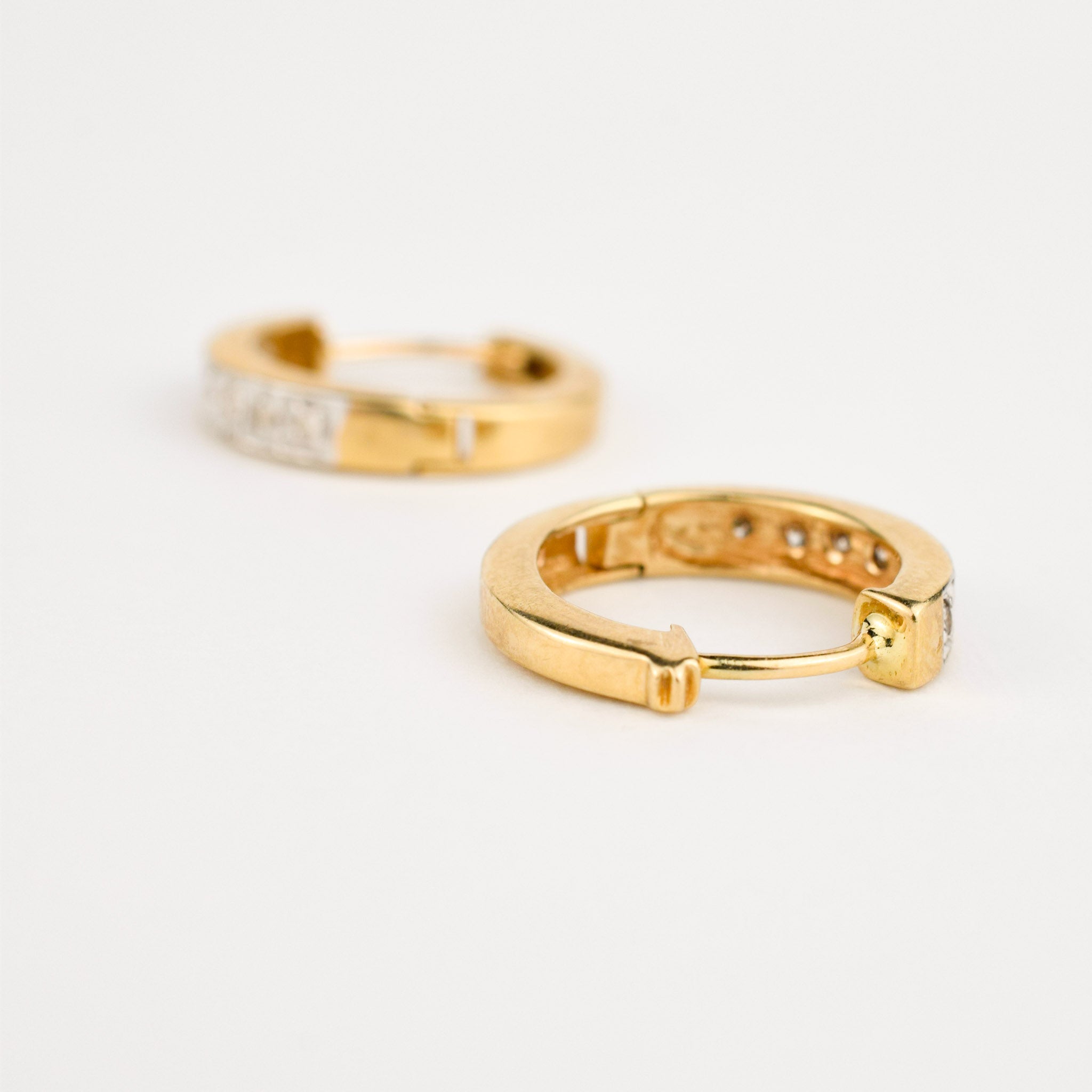 yellow gold diamond huggie hoop earrings
