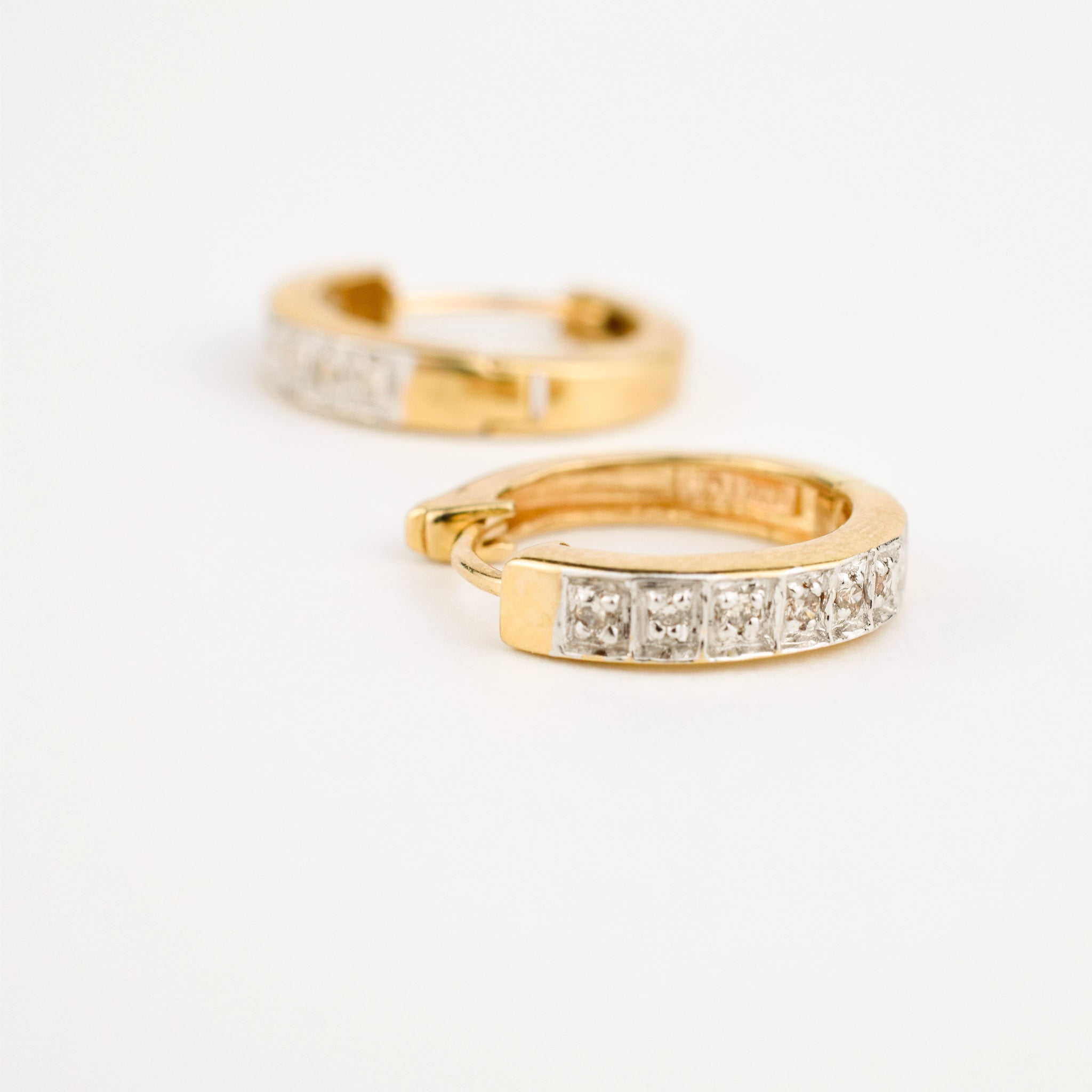 yellow gold diamond huggie hoop earrings